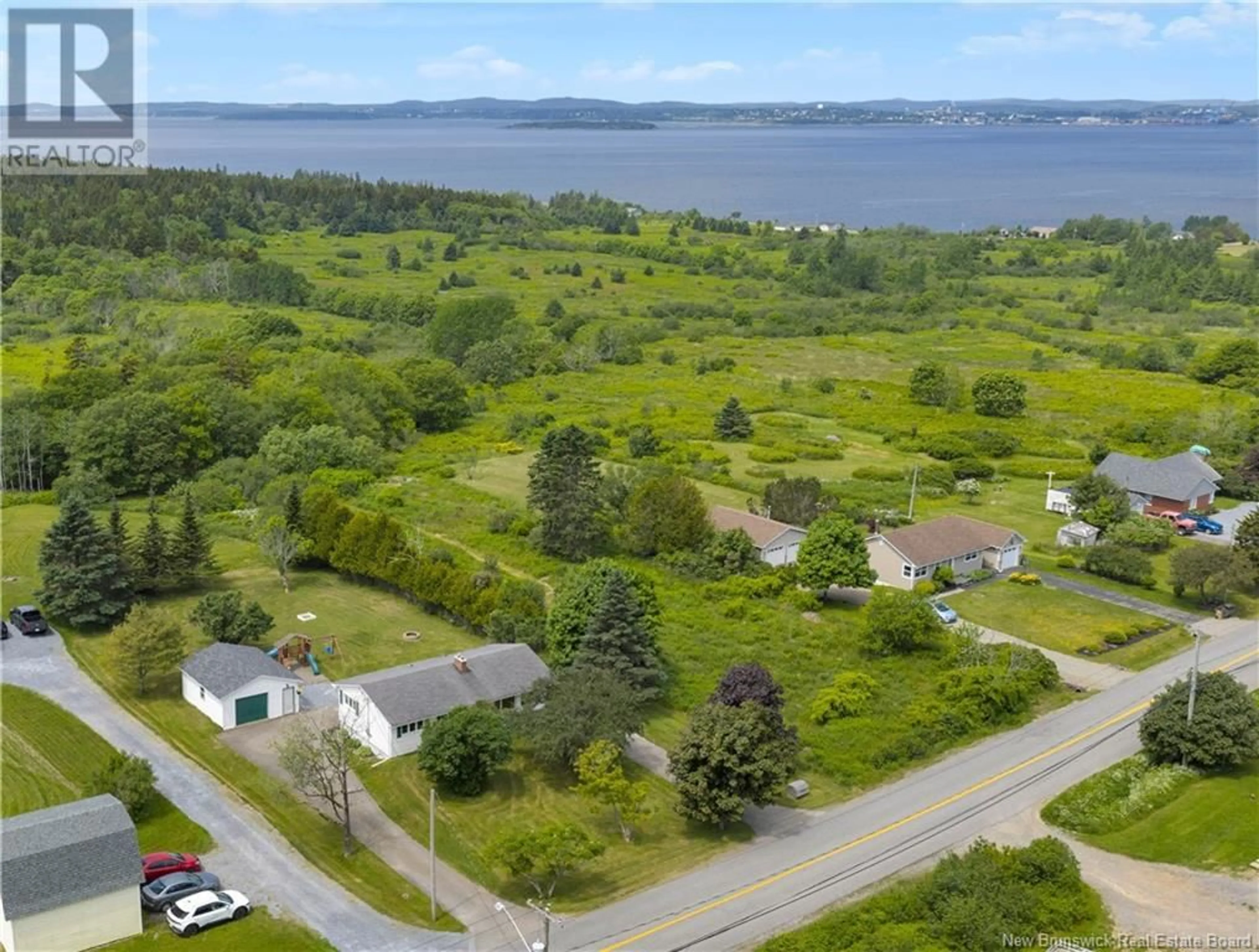 A pic from outside/outdoor area/front of a property/back of a property/a pic from drone, water/lake/river/ocean view for 1950 RED HEAD ROAD, Saint John New Brunswick E2P1L2