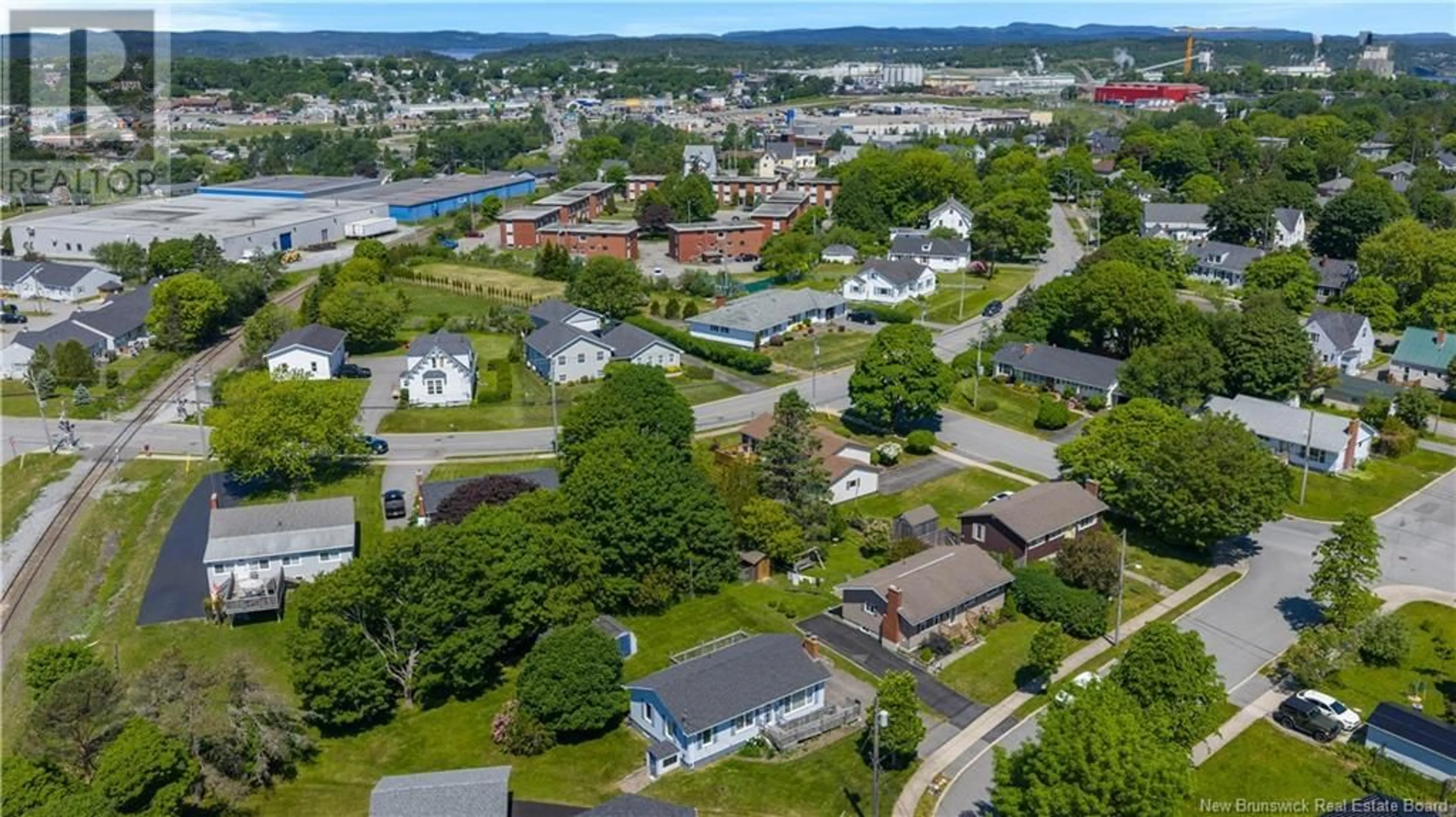 A pic from outside/outdoor area/front of a property/back of a property/a pic from drone, street for 392 ELMORE CRESCENT, Saint John New Brunswick E2M3C1