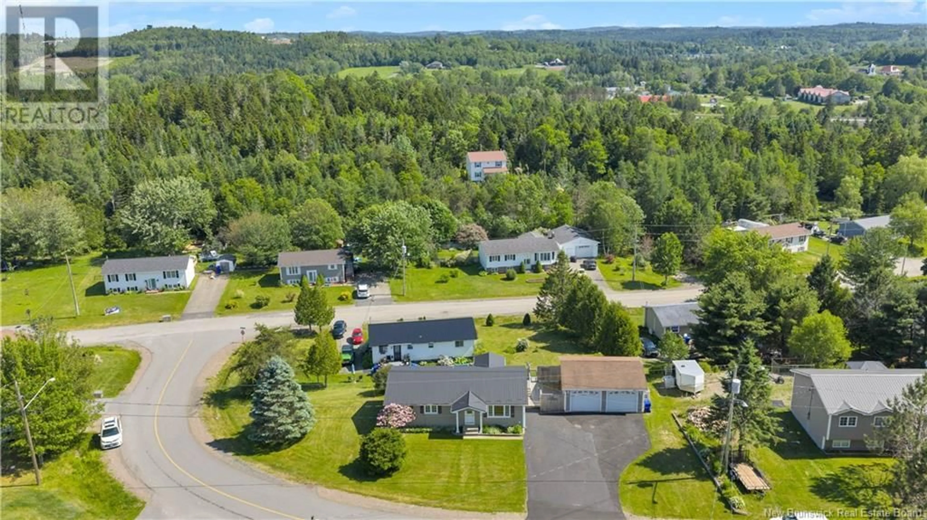 A pic from outside/outdoor area/front of a property/back of a property/a pic from drone, unknown for 15 ARMSTRONG CRESCENT, St George New Brunswick E5C1A1