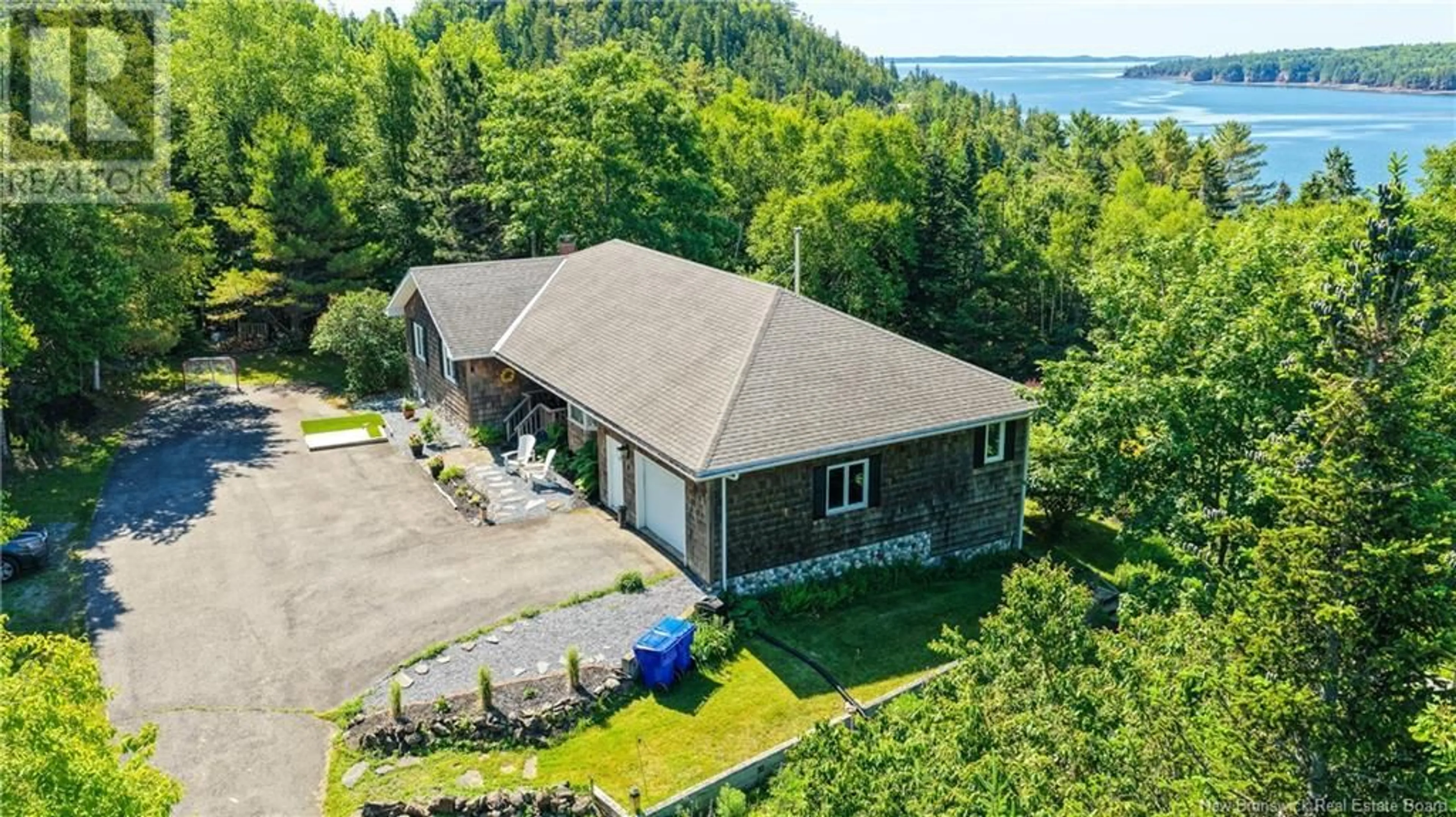 A pic from outside/outdoor area/front of a property/back of a property/a pic from drone, water/lake/river/ocean view for 11 MCLAREN DRIVE, Chamcook New Brunswick E5B3E3