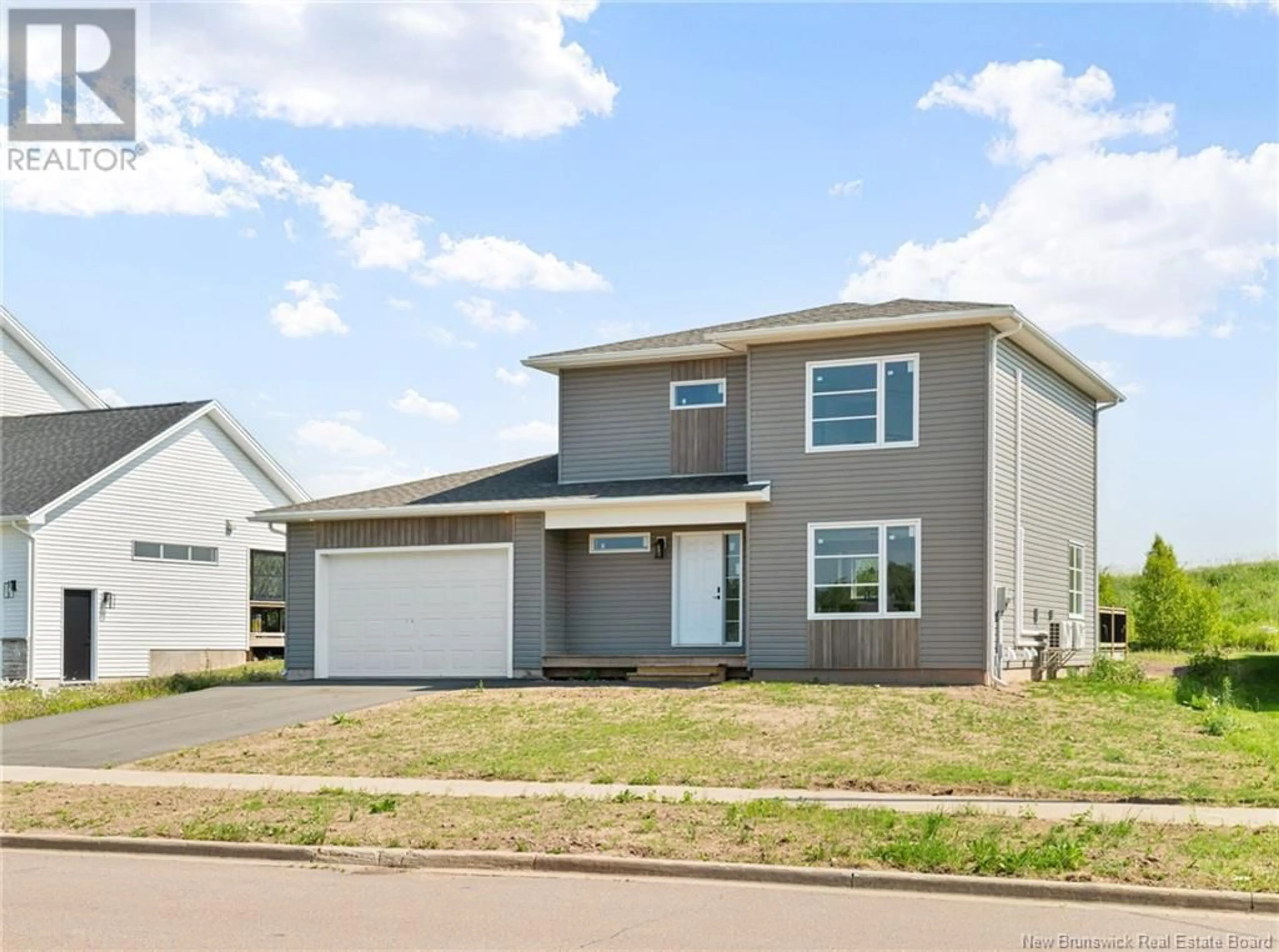 Home with vinyl exterior material, street for 117 KING'S BRIDGE BOULEVARD, Moncton New Brunswick E1G5R7