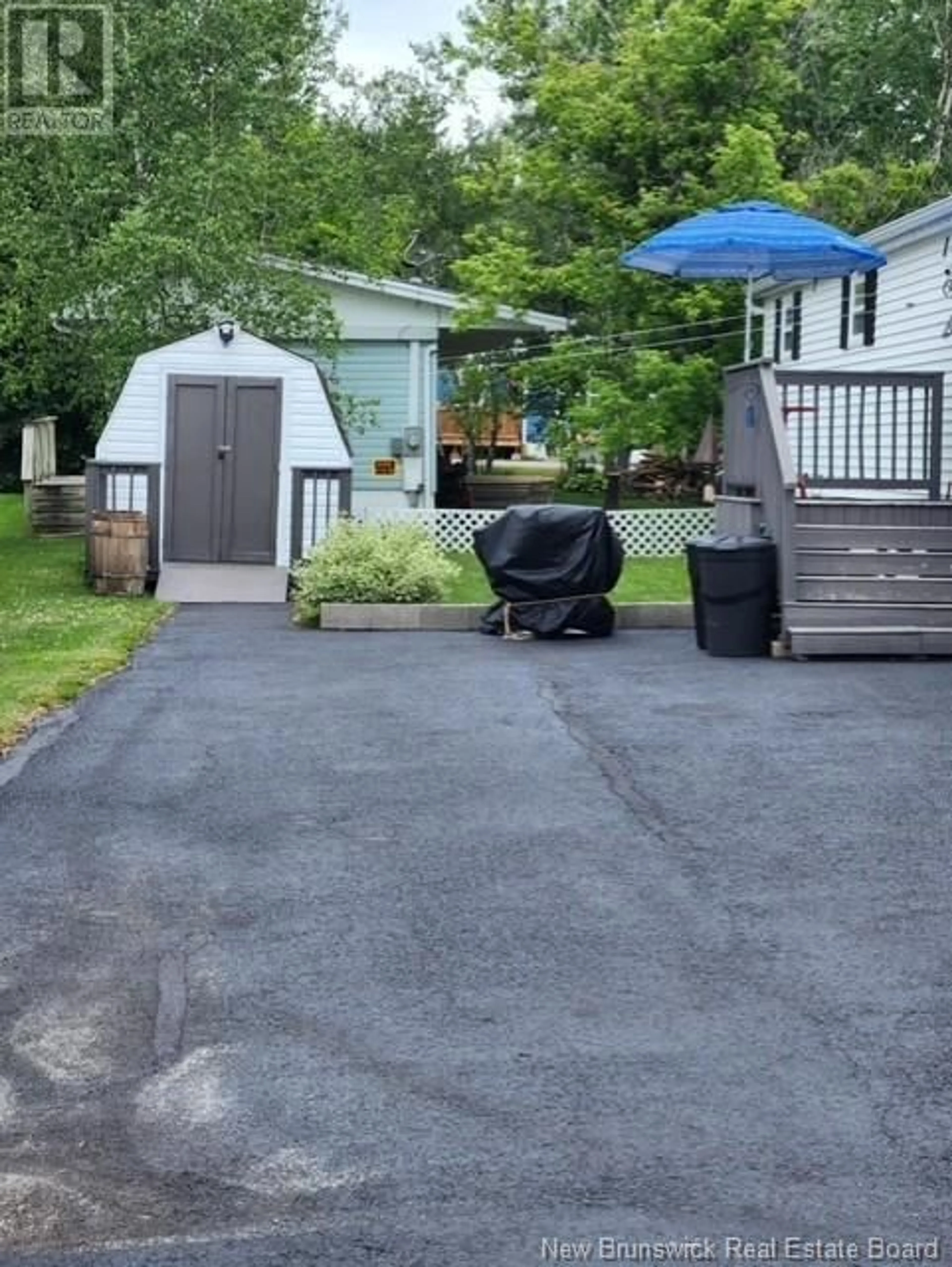 A pic from outside/outdoor area/front of a property/back of a property/a pic from drone, street for 10 MIDWAY, Moncton New Brunswick E1E2J5