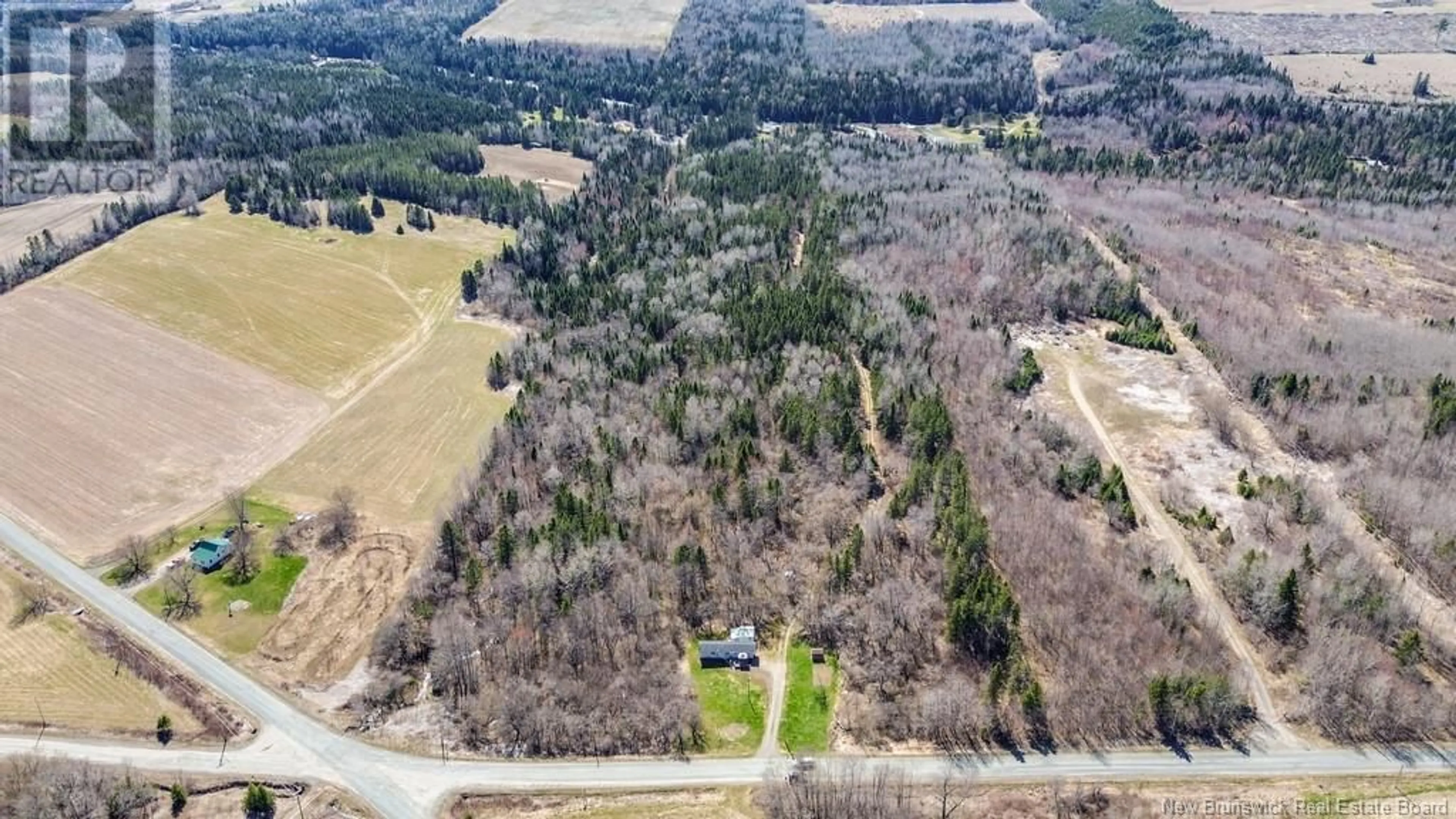 A pic from outside/outdoor area/front of a property/back of a property/a pic from drone, forest/trees view for 437 565 ROUTE, Johnville New Brunswick E7J1M8
