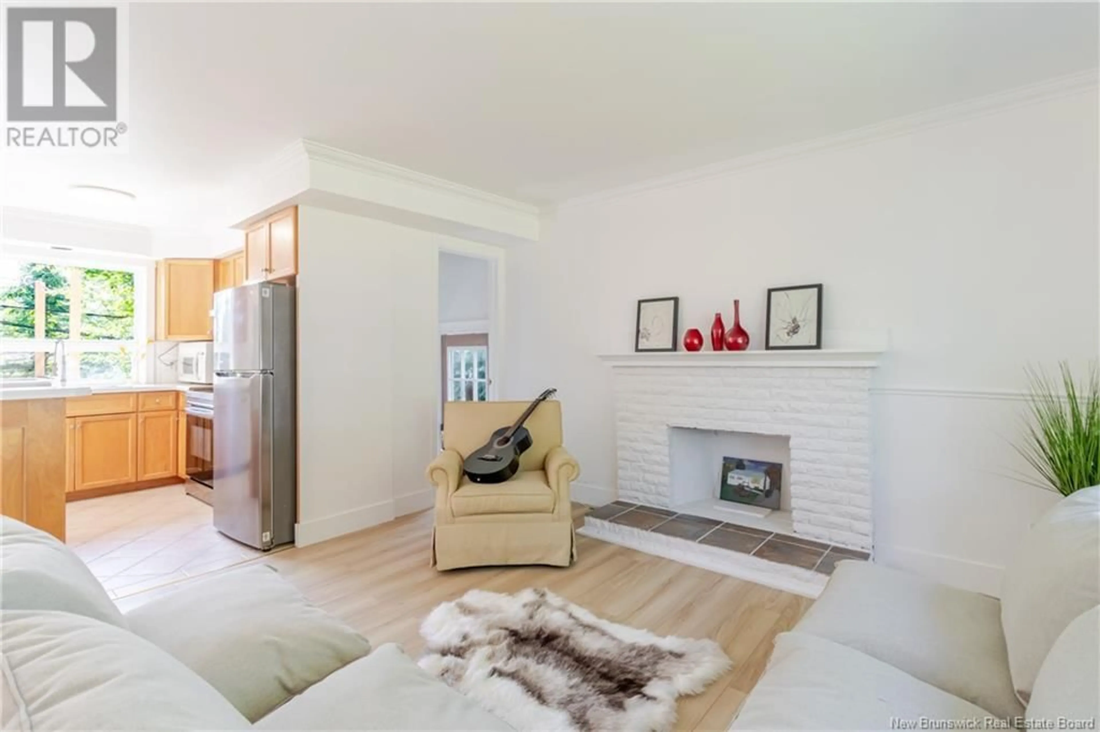 Living room with furniture, wood/laminate floor for 92 COVENTRY CRESCENT, Fredericton New Brunswick E3B4P5