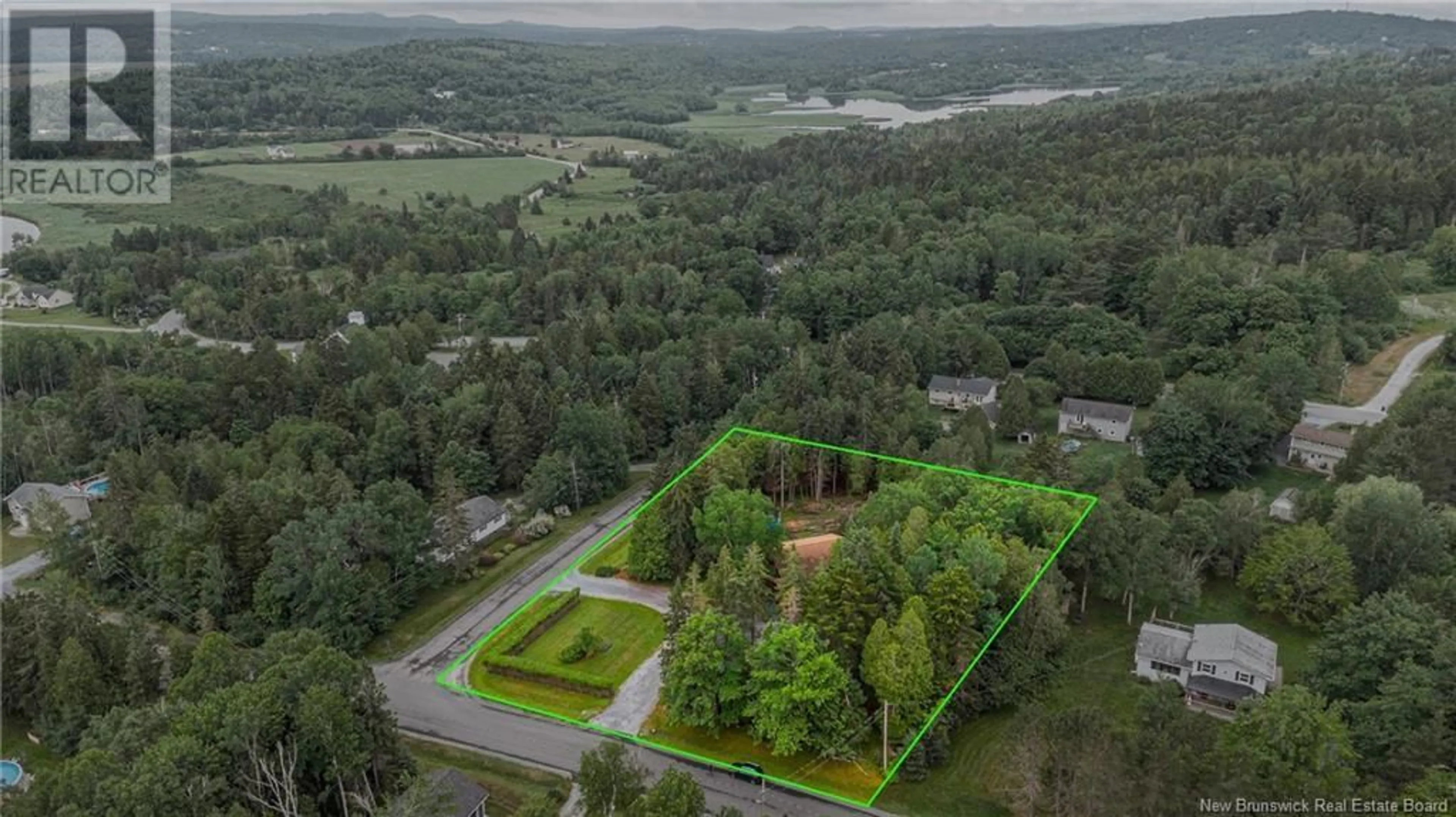 A pic from outside/outdoor area/front of a property/back of a property/a pic from drone, forest/trees view for 1 CLIFF STREET, Quispamsis New Brunswick E2G1G3