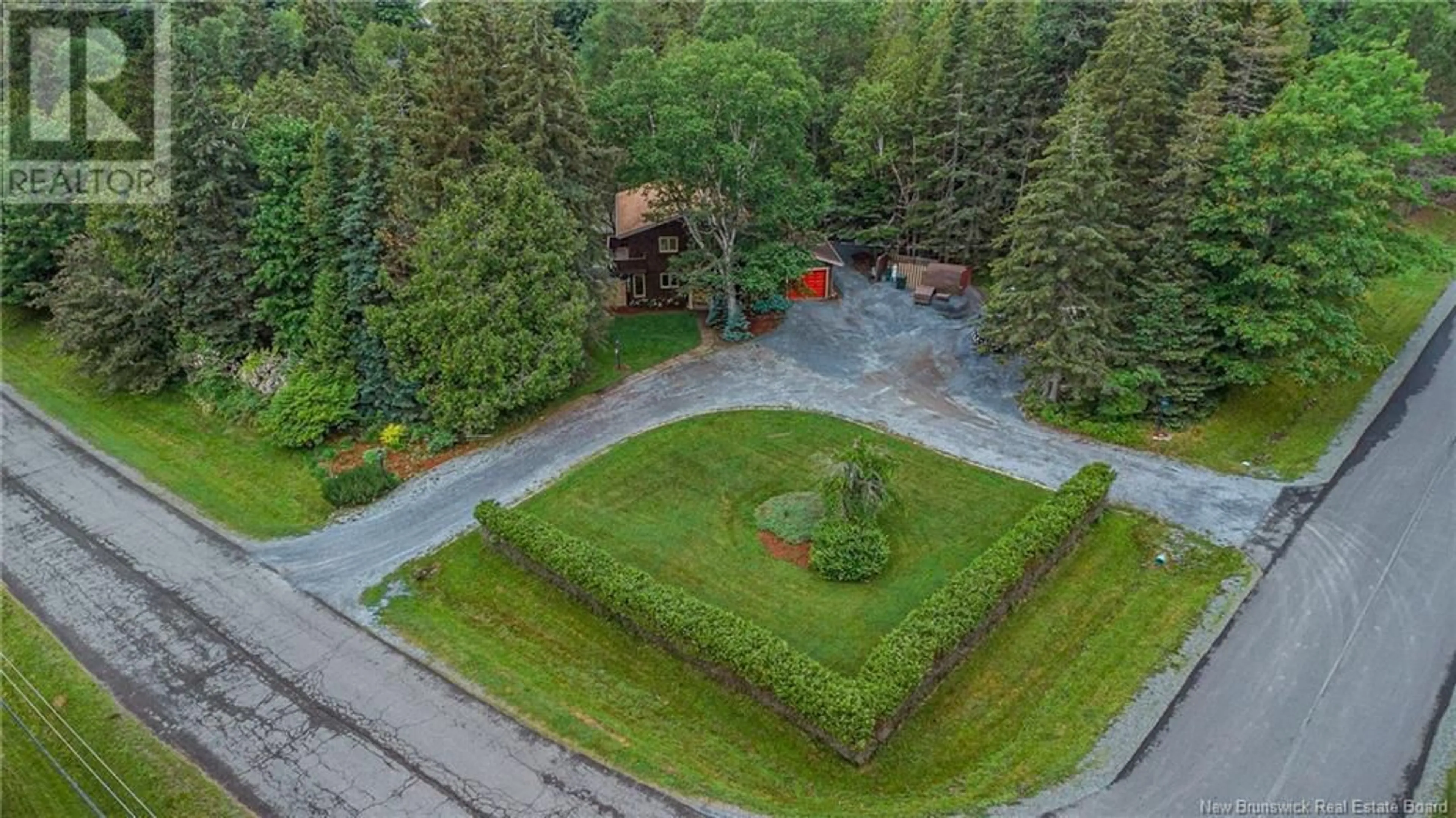 A pic from outside/outdoor area/front of a property/back of a property/a pic from drone, forest/trees view for 1 CLIFF STREET, Quispamsis New Brunswick E2G1G3