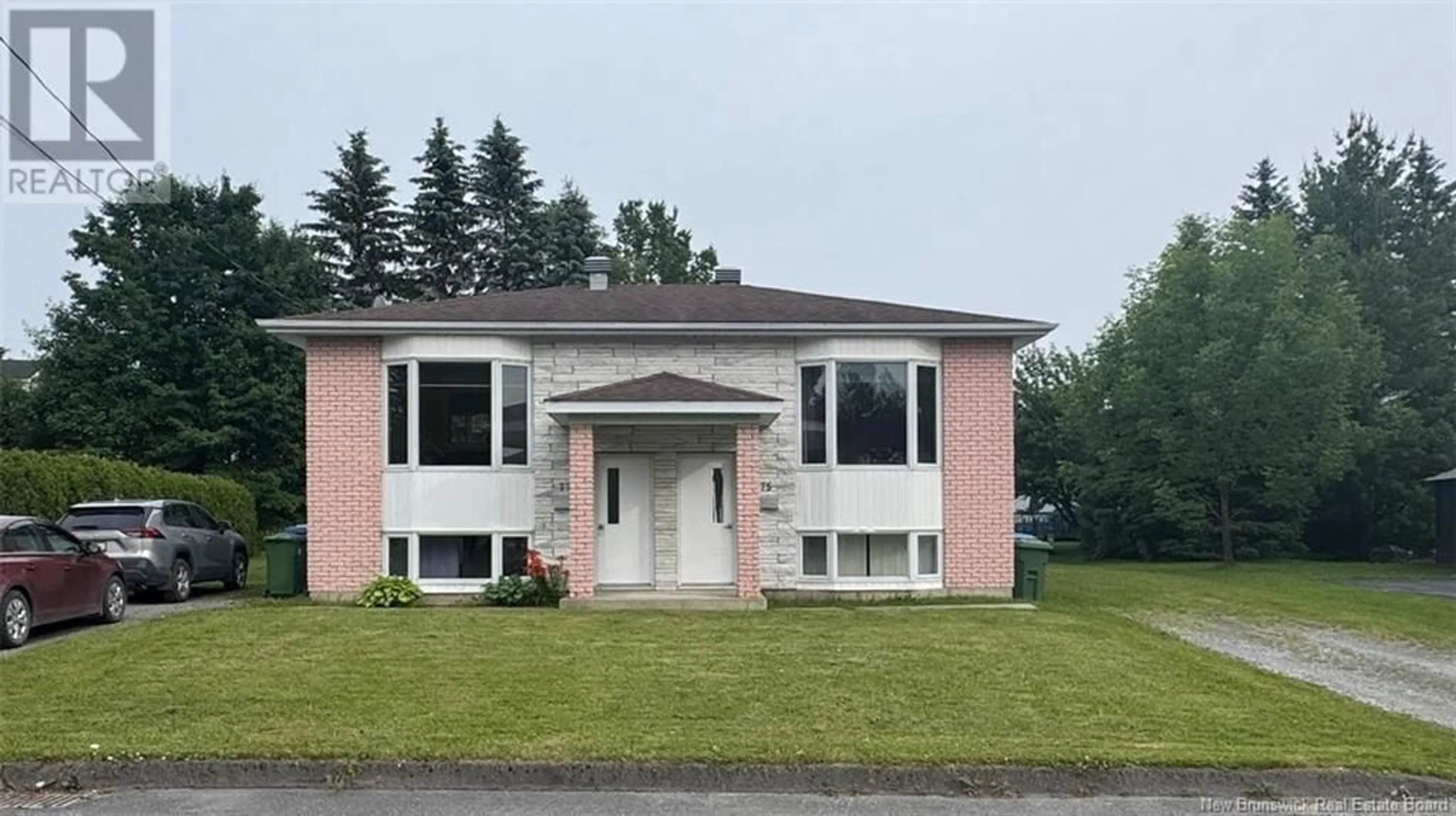 Home with vinyl exterior material, unknown for 75-77 BELISLE AVENUE, Edmundston New Brunswick E3V3W9
