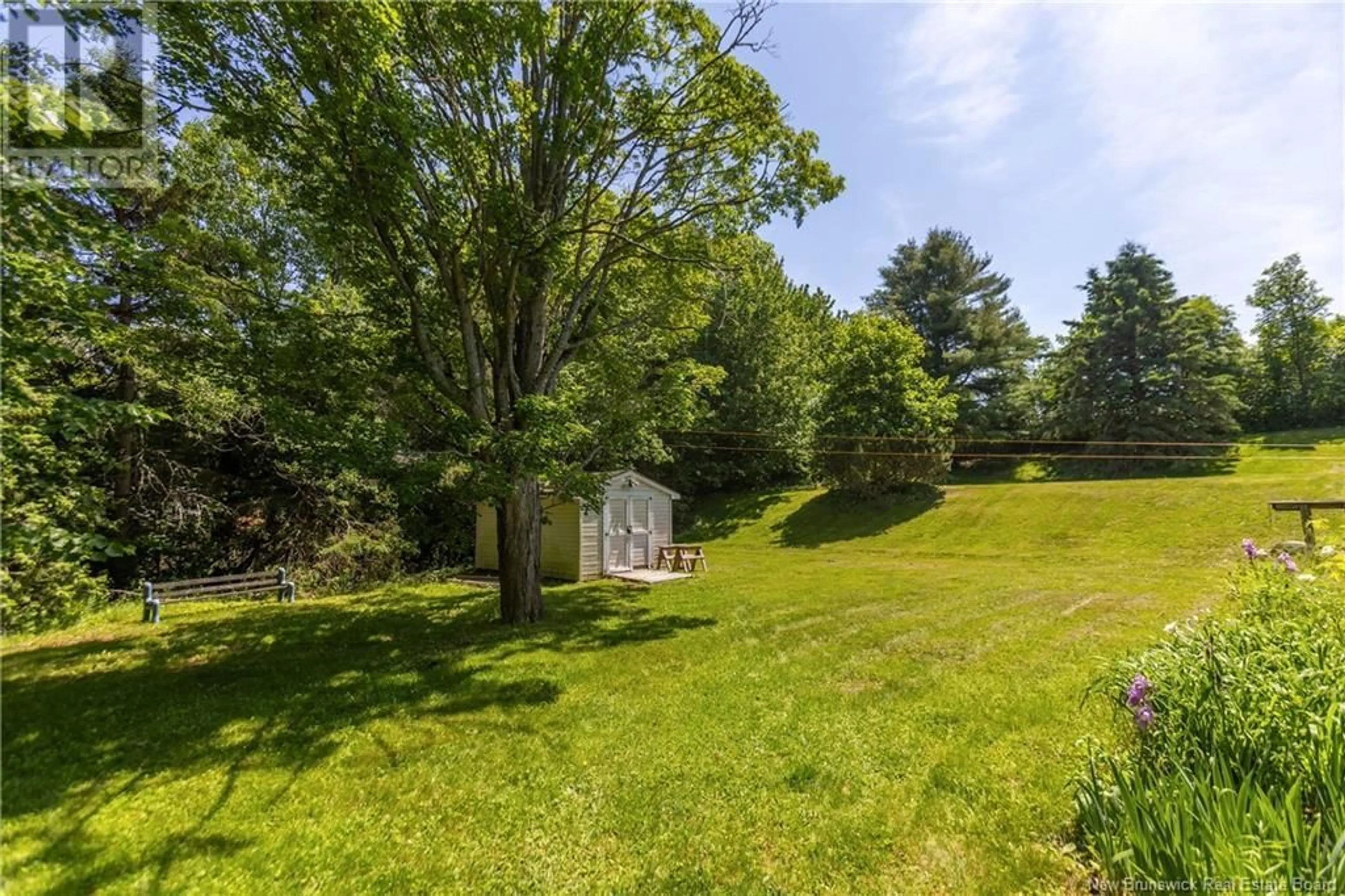 A pic from outside/outdoor area/front of a property/back of a property/a pic from drone, forest/trees view for 18 MOFFATT LANE, Sackville New Brunswick E4L4E1