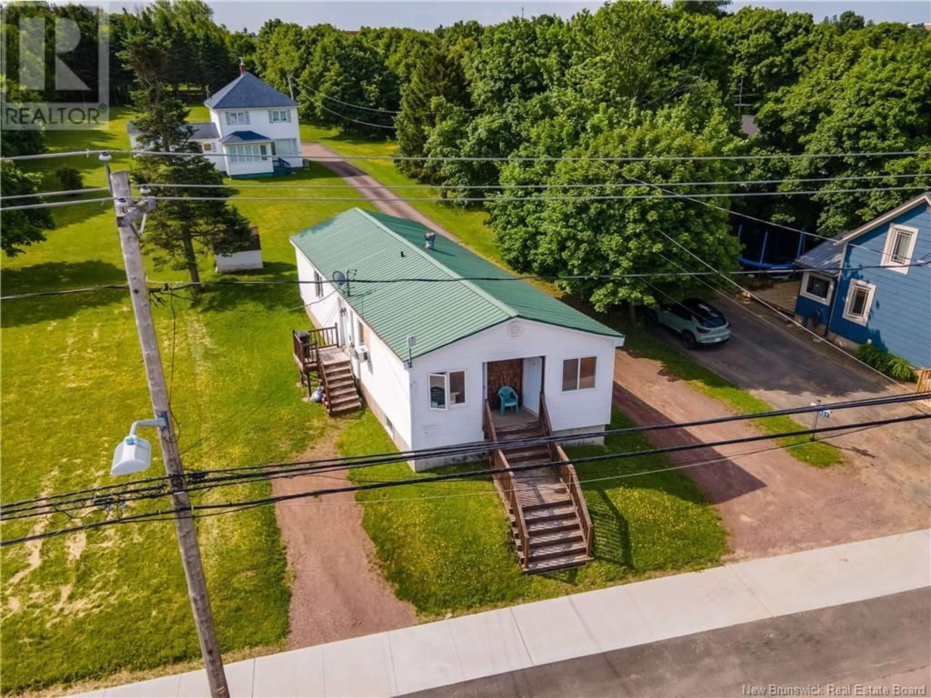 A pic from outside/outdoor area/front of a property/back of a property/a pic from drone, street for 459 MAIN STREET, Shediac New Brunswick E4P2C2