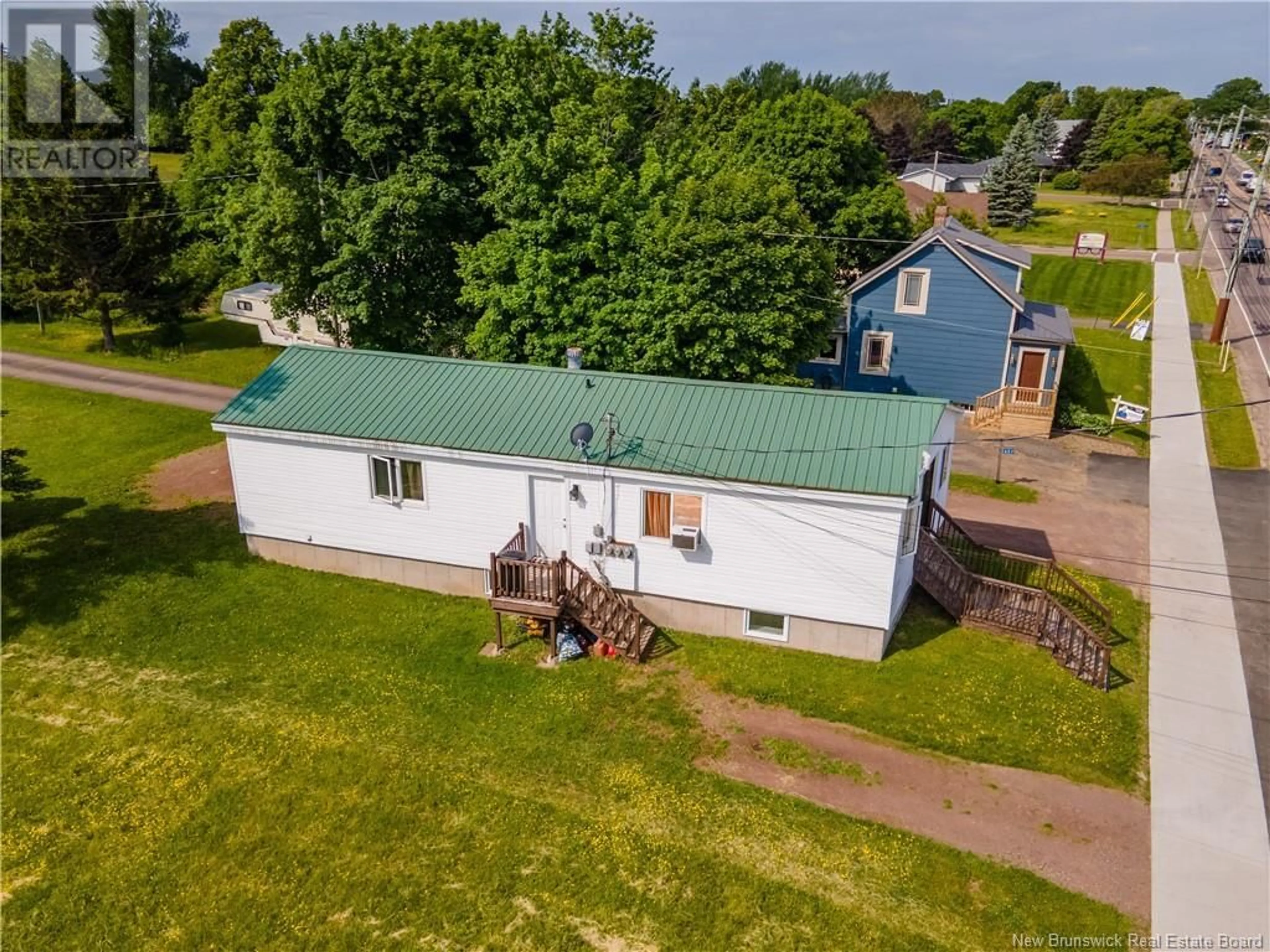 A pic from outside/outdoor area/front of a property/back of a property/a pic from drone, unknown for 459 MAIN STREET, Shediac New Brunswick E4P2C2