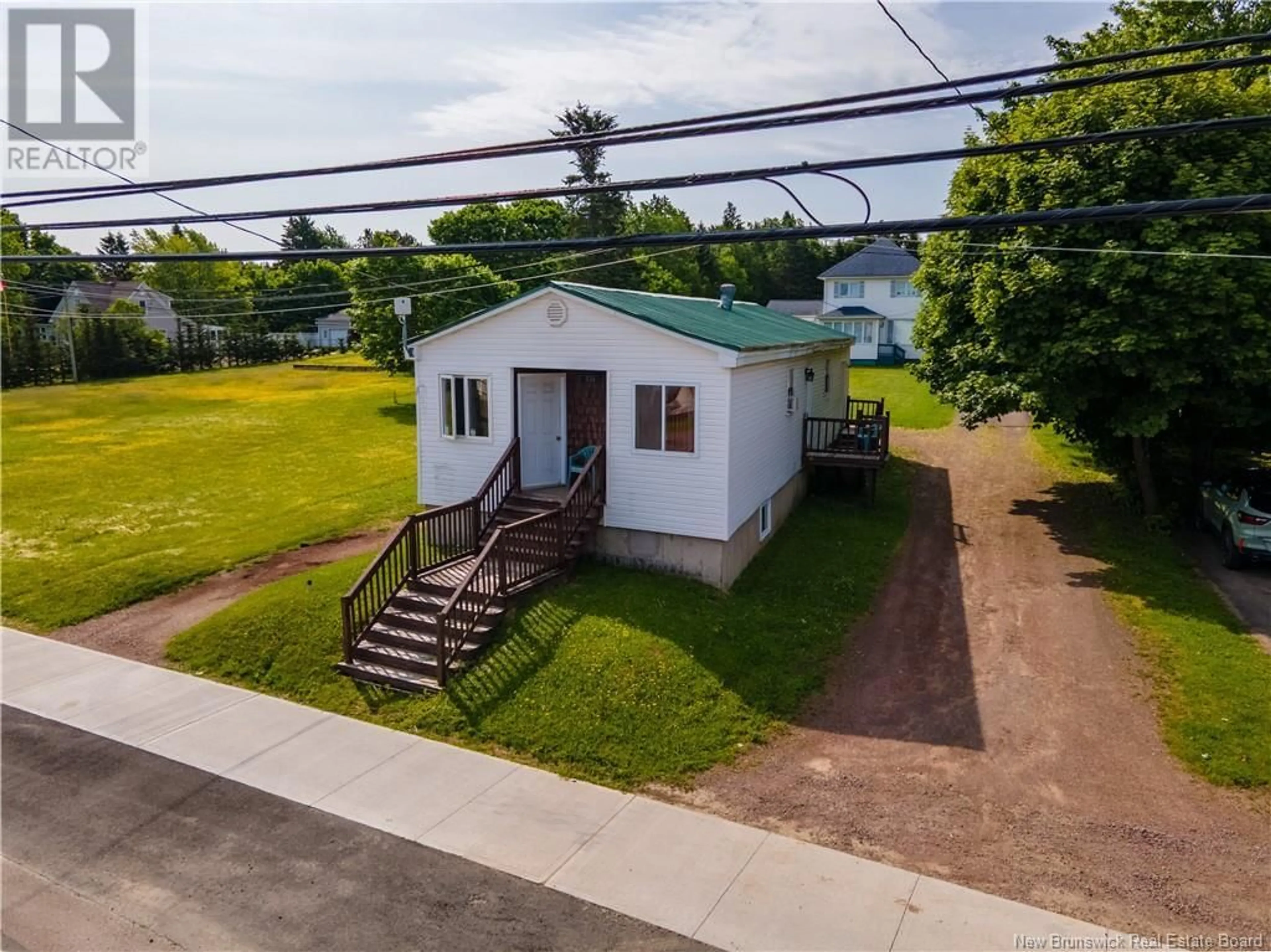 A pic from outside/outdoor area/front of a property/back of a property/a pic from drone, water/lake/river/ocean view for 459 MAIN STREET, Shediac New Brunswick E4P2C2