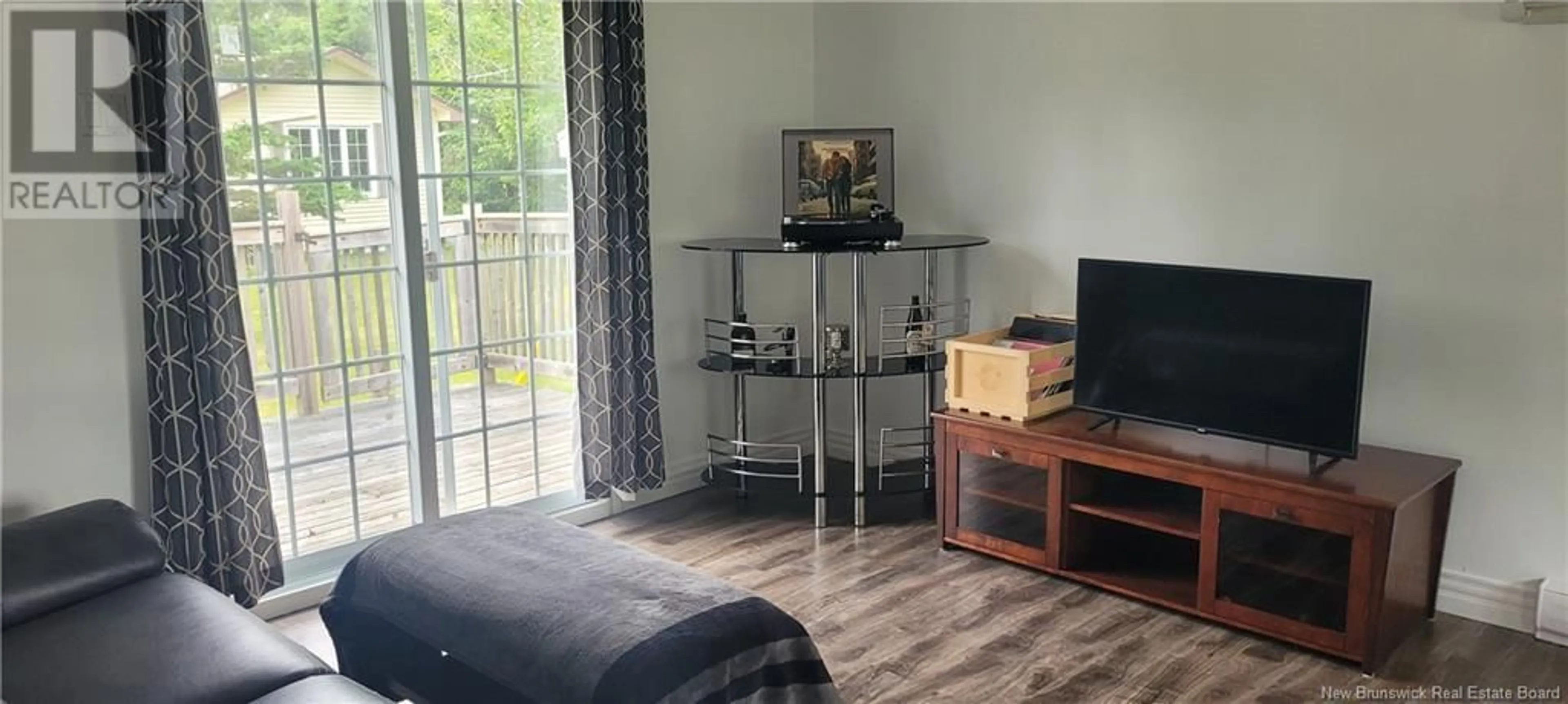 Living room with furniture, wood/laminate floor for 3739 ROUTE 134, Shediac Bridge New Brunswick E4R1S3