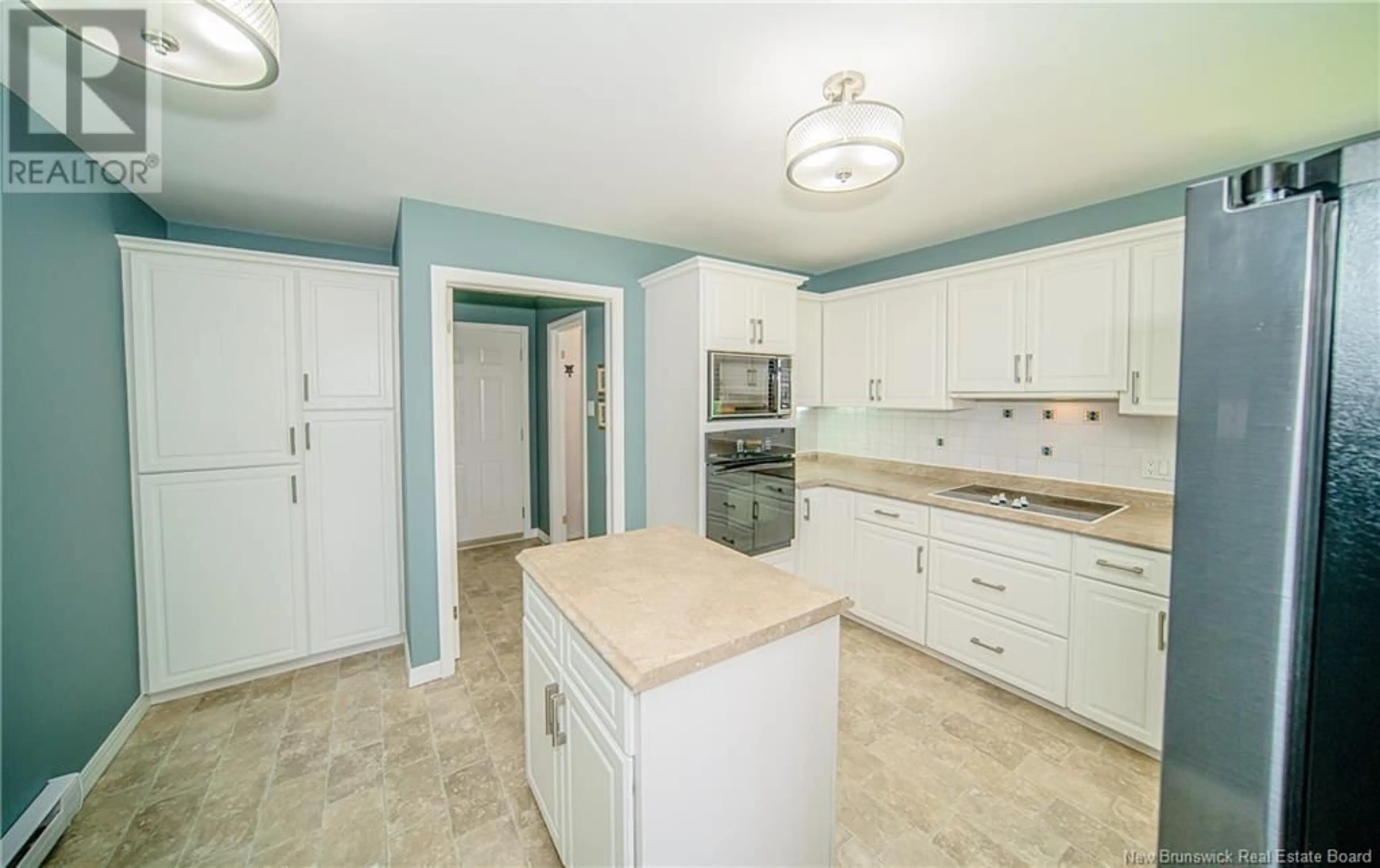 Open concept kitchen, ceramic/tile floor for 42 CRAIG STREET, Oromocto New Brunswick E2V2R4
