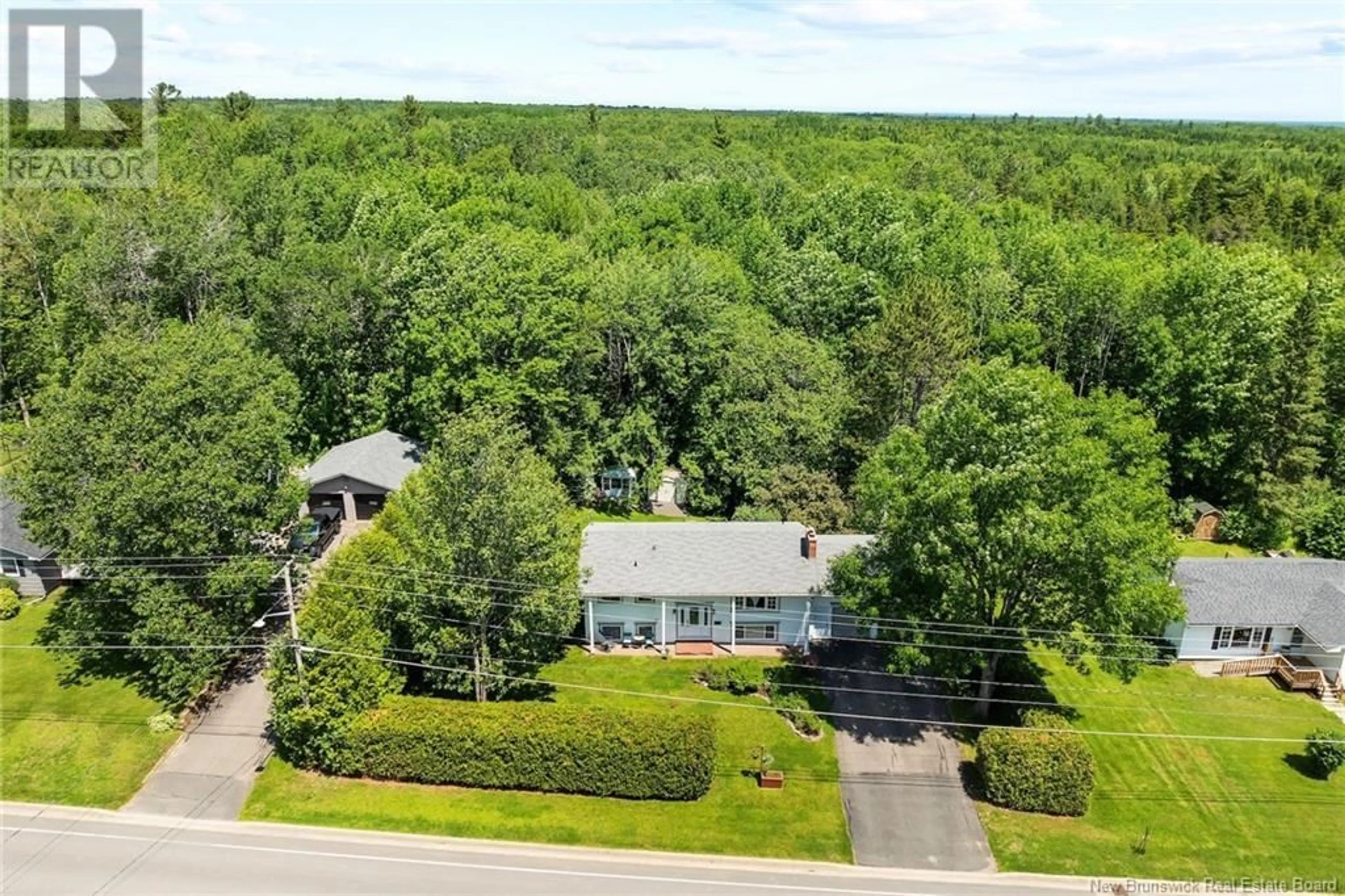 A pic from outside/outdoor area/front of a property/back of a property/a pic from drone, forest/trees view for 151 SUNRISE ESTATES DRIVE, New Maryland New Brunswick E3C1G6
