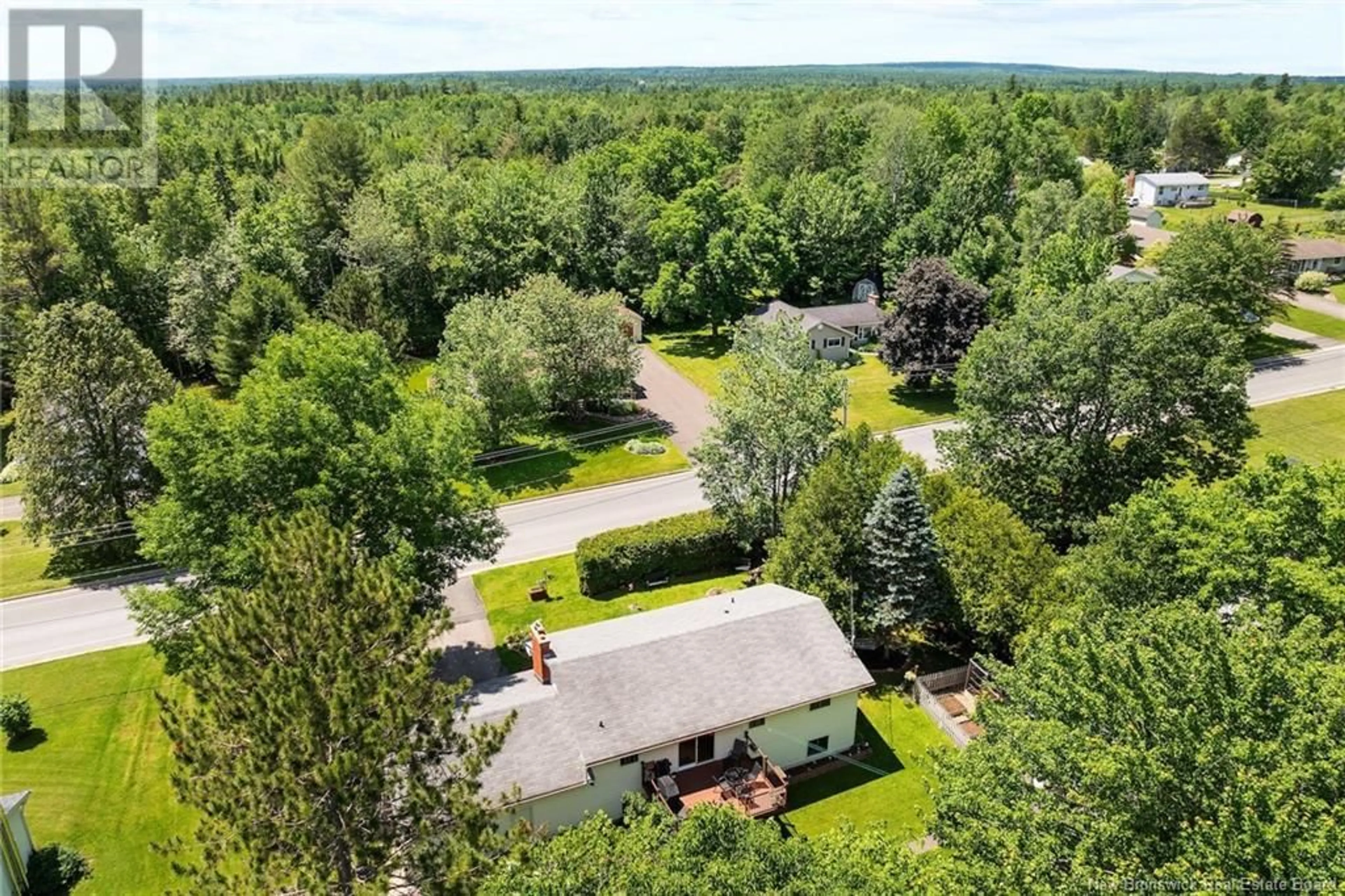 A pic from outside/outdoor area/front of a property/back of a property/a pic from drone, forest/trees view for 151 SUNRISE ESTATES DRIVE, New Maryland New Brunswick E3C1G6