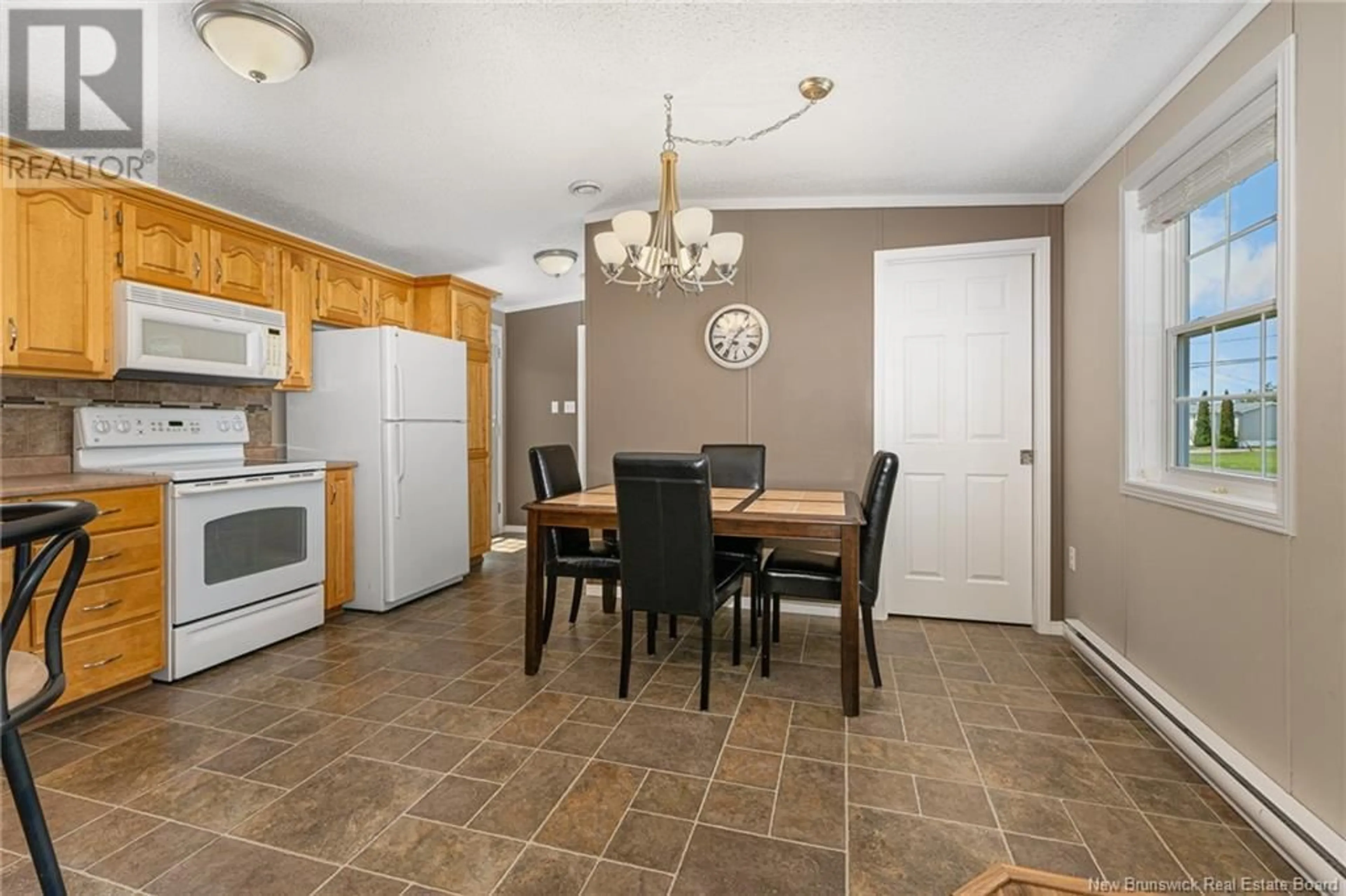 Dining room, ceramic/tile floor for 43 TRACADIE DRIVE, Dieppe New Brunswick E1A8P2