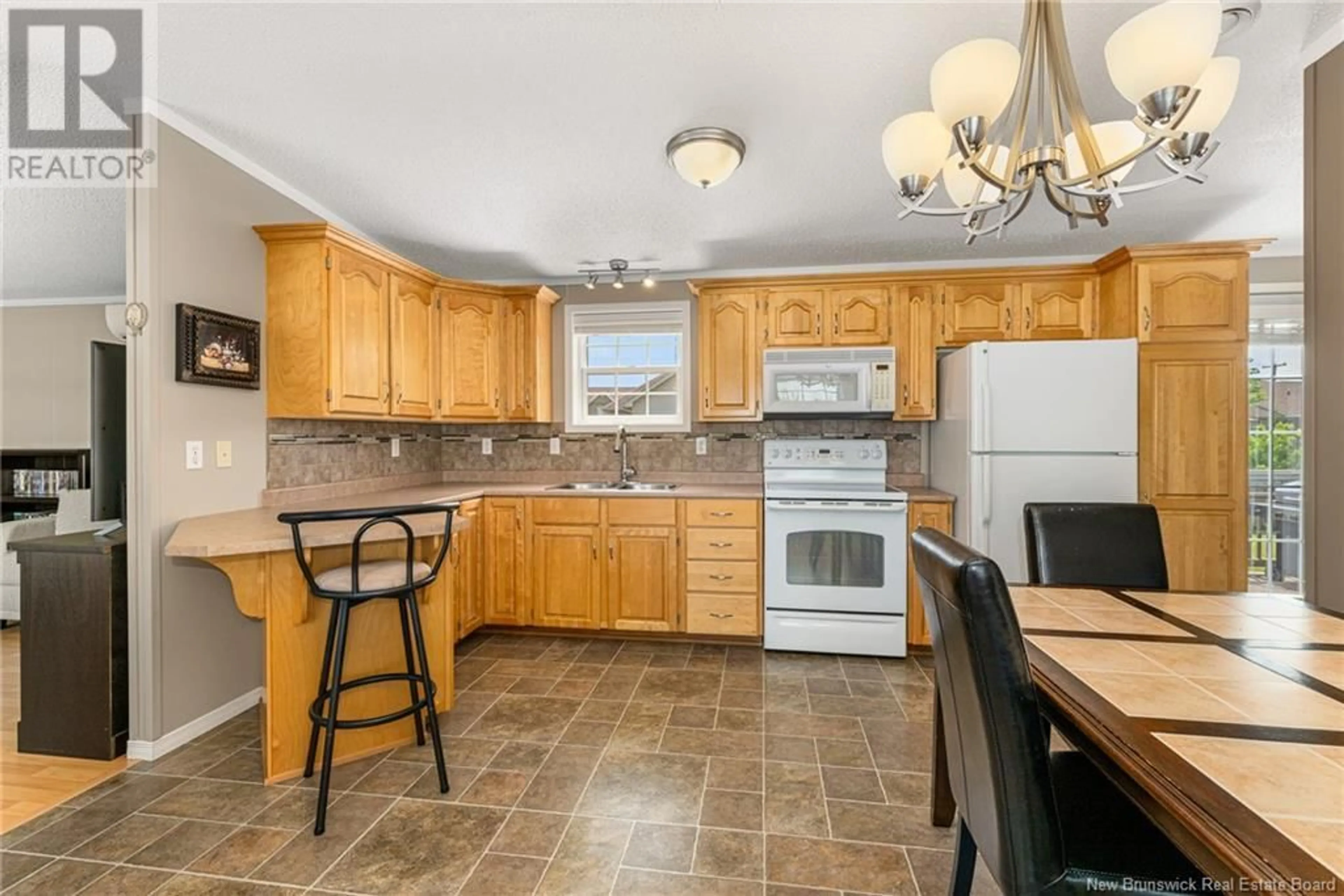 Open concept kitchen, ceramic/tile floor for 43 TRACADIE DRIVE, Dieppe New Brunswick E1A8P2