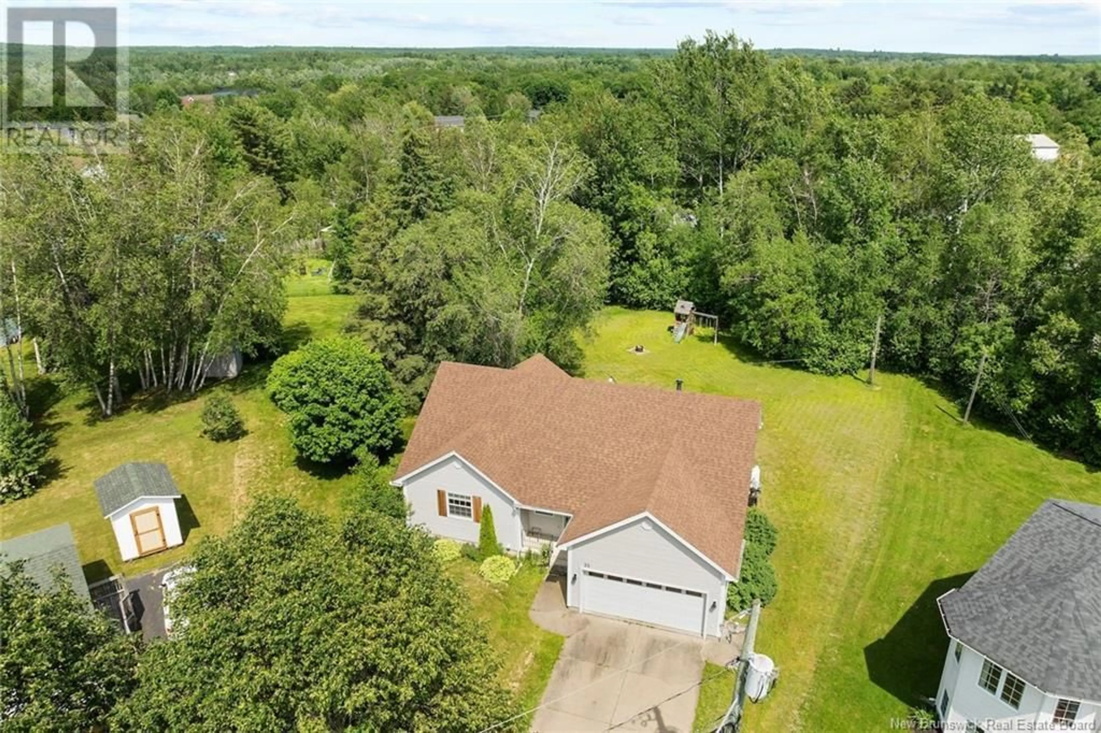 A pic from outside/outdoor area/front of a property/back of a property/a pic from drone, water/lake/river/ocean view for 22 TRAINOR COURT, Fredericton New Brunswick E3B7J7