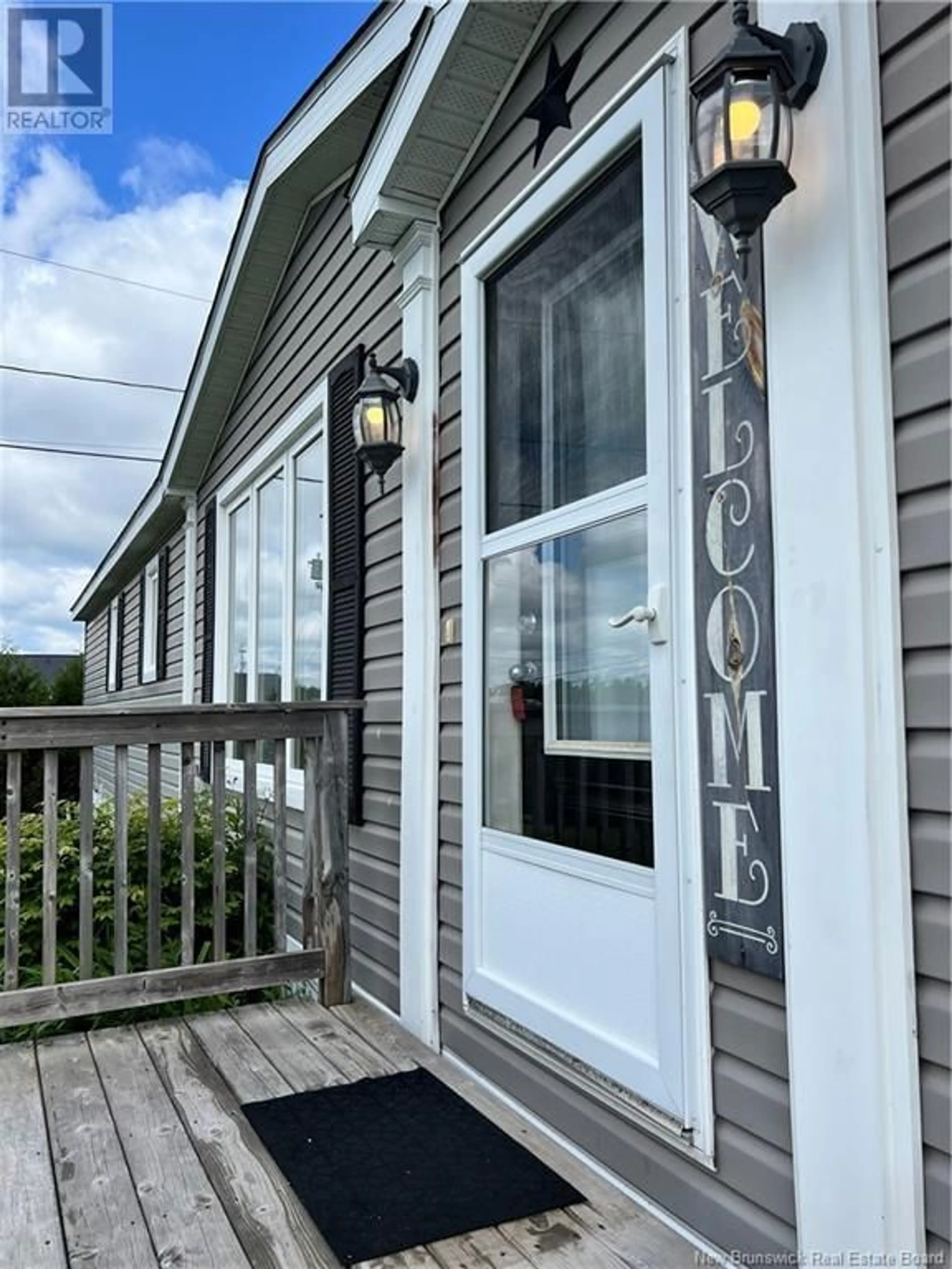 Home with vinyl exterior material, street for 5 FRASER STREET, St. Stephen New Brunswick E3L4B5