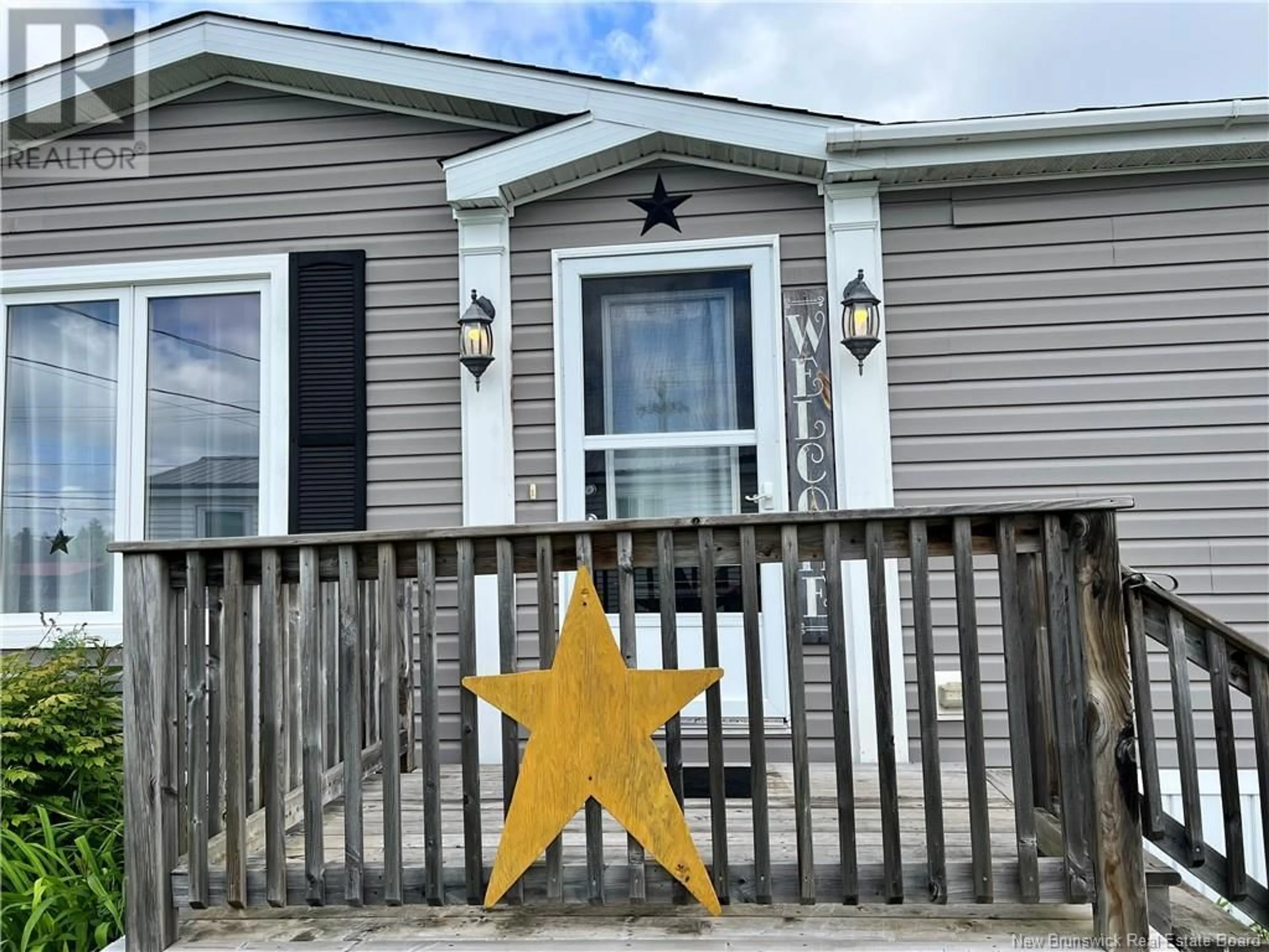 Home with vinyl exterior material, street for 5 FRASER STREET, St. Stephen New Brunswick E3L4B5