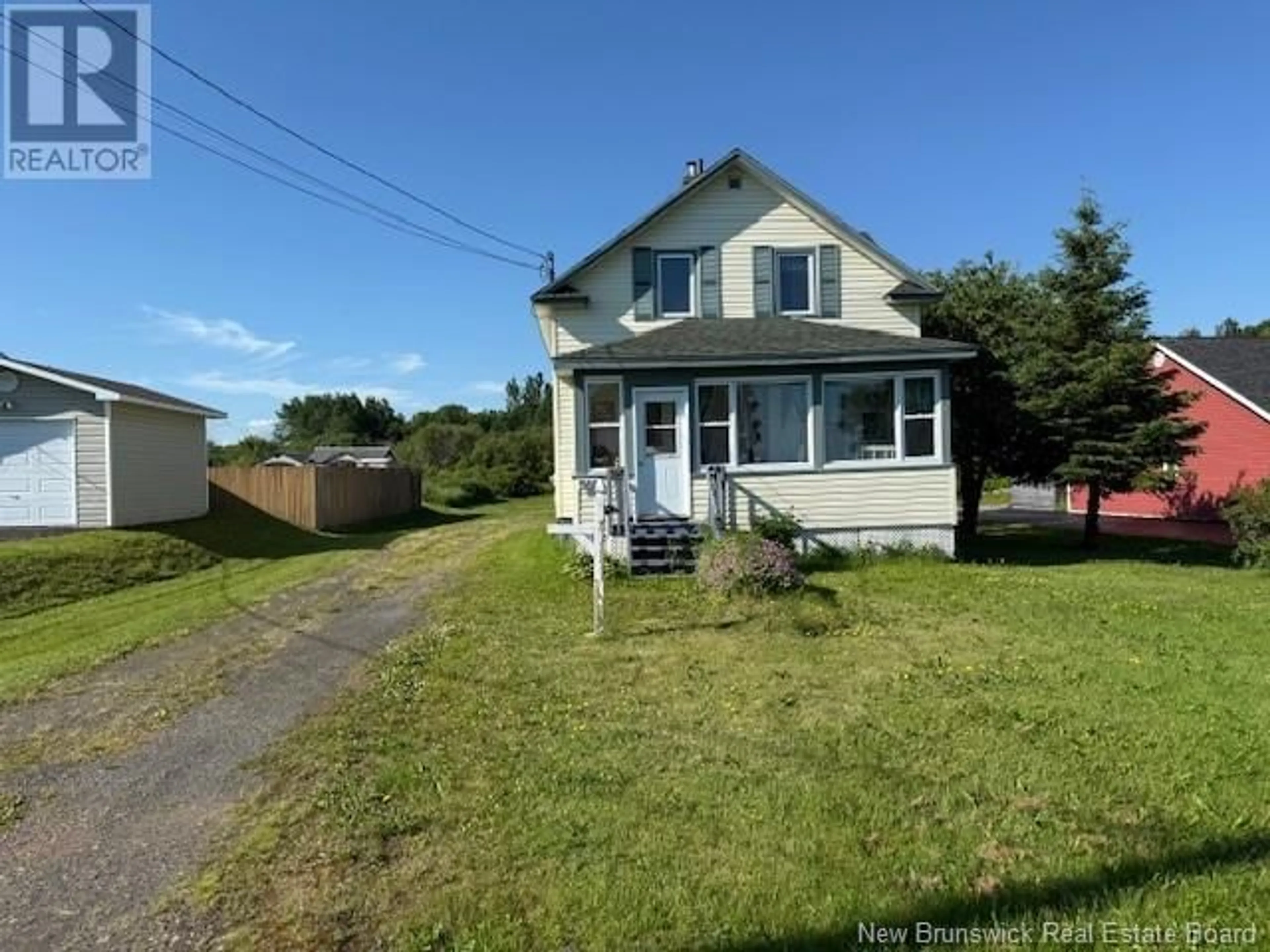 A pic from outside/outdoor area/front of a property/back of a property/a pic from drone, street for 568 CHALEUR STREET, Charlo New Brunswick E8E2G6
