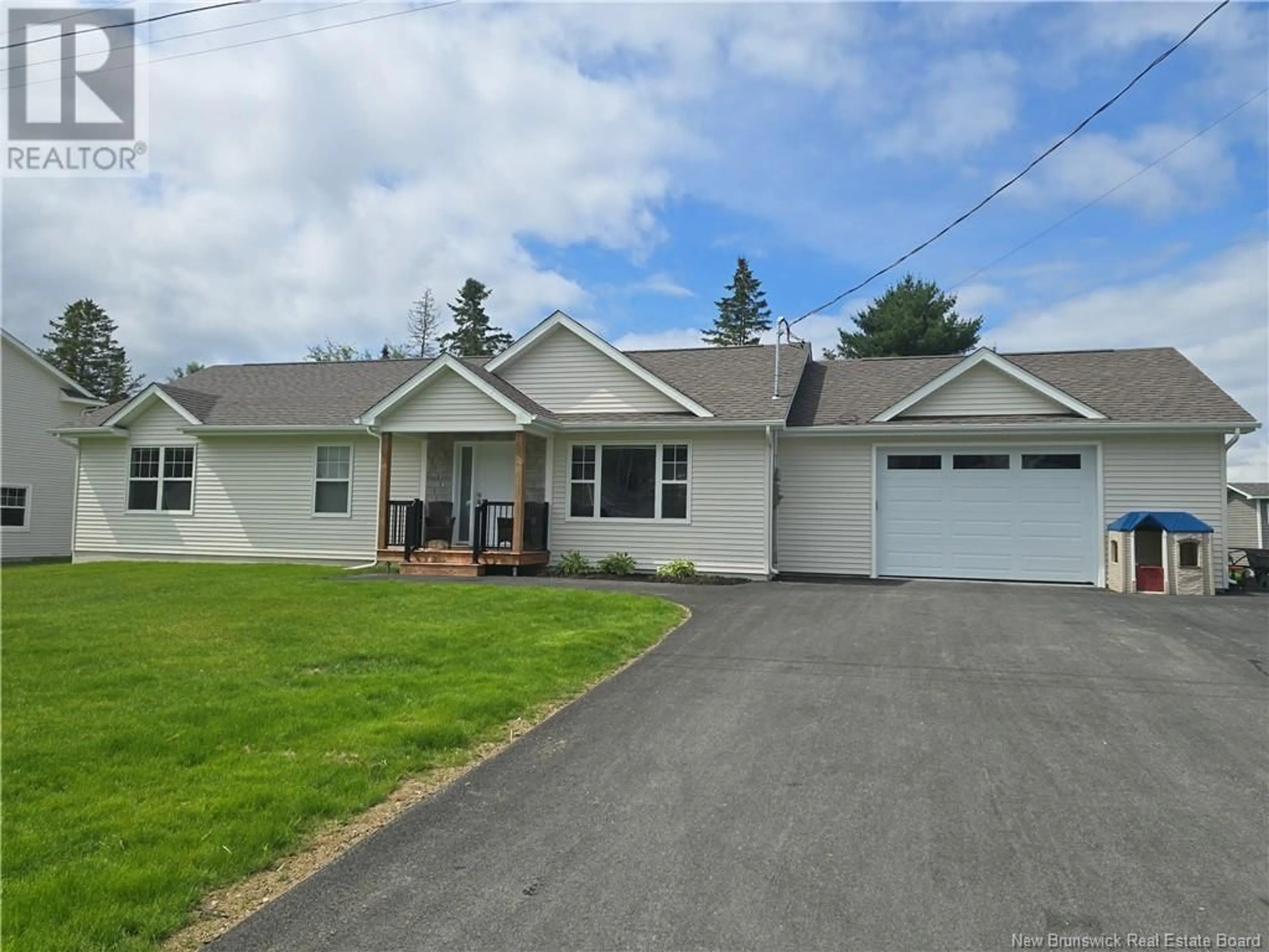 Home with vinyl exterior material, street for 207 CARROLL STREET, Miramichi New Brunswick E1V0M3