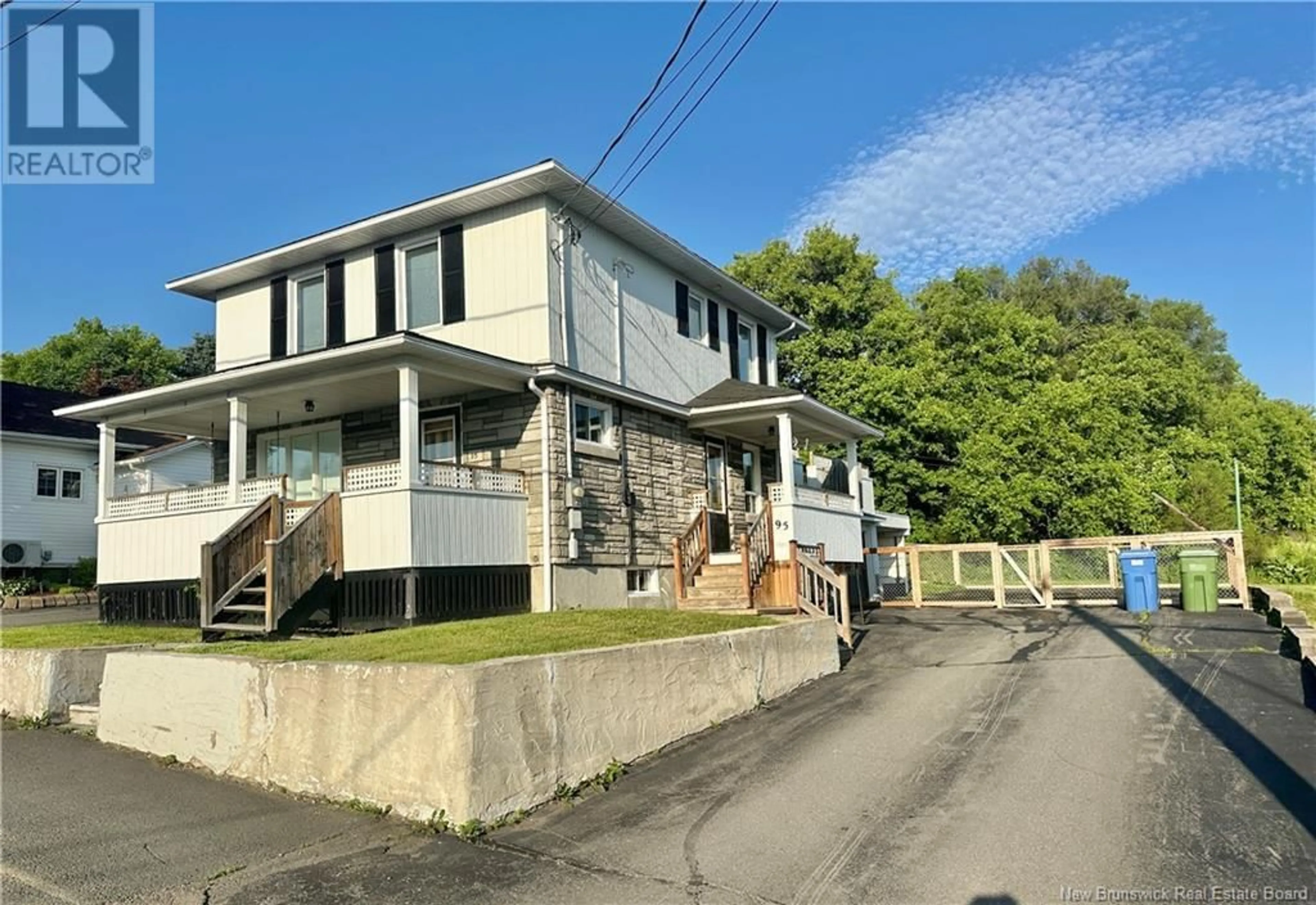 A pic from outside/outdoor area/front of a property/back of a property/a pic from drone, street for 95 34E AVENUE, Edmundston New Brunswick E3V2T4