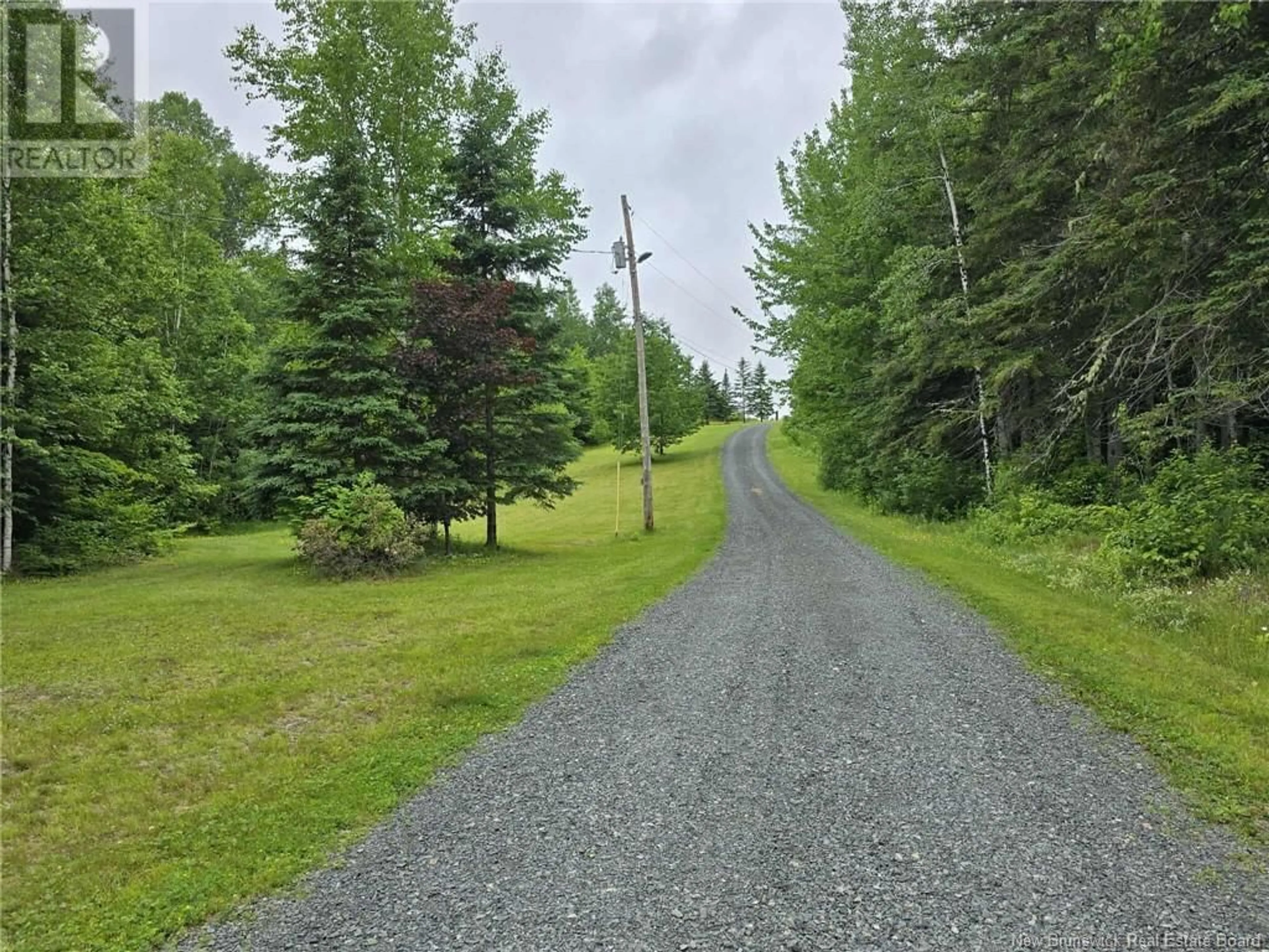 A pic from outside/outdoor area/front of a property/back of a property/a pic from drone, forest/trees view for 853 HINTON, Dunlop New Brunswick E8K2K1