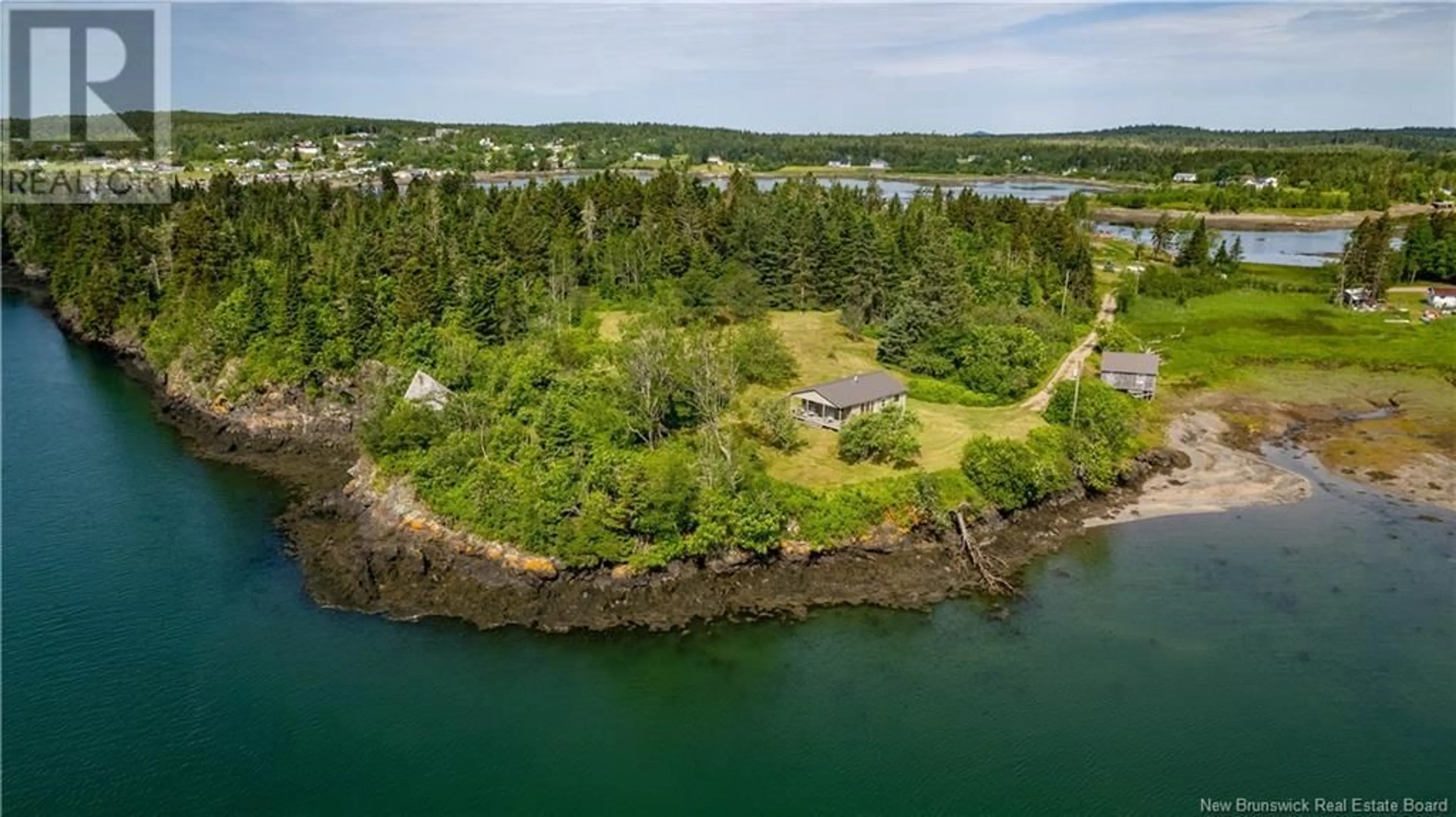 A pic from outside/outdoor area/front of a property/back of a property/a pic from drone, water/lake/river/ocean view for 23 LEAVITT HEAD CEMETERY ROAD, Back Bay New Brunswick E5C1Z5