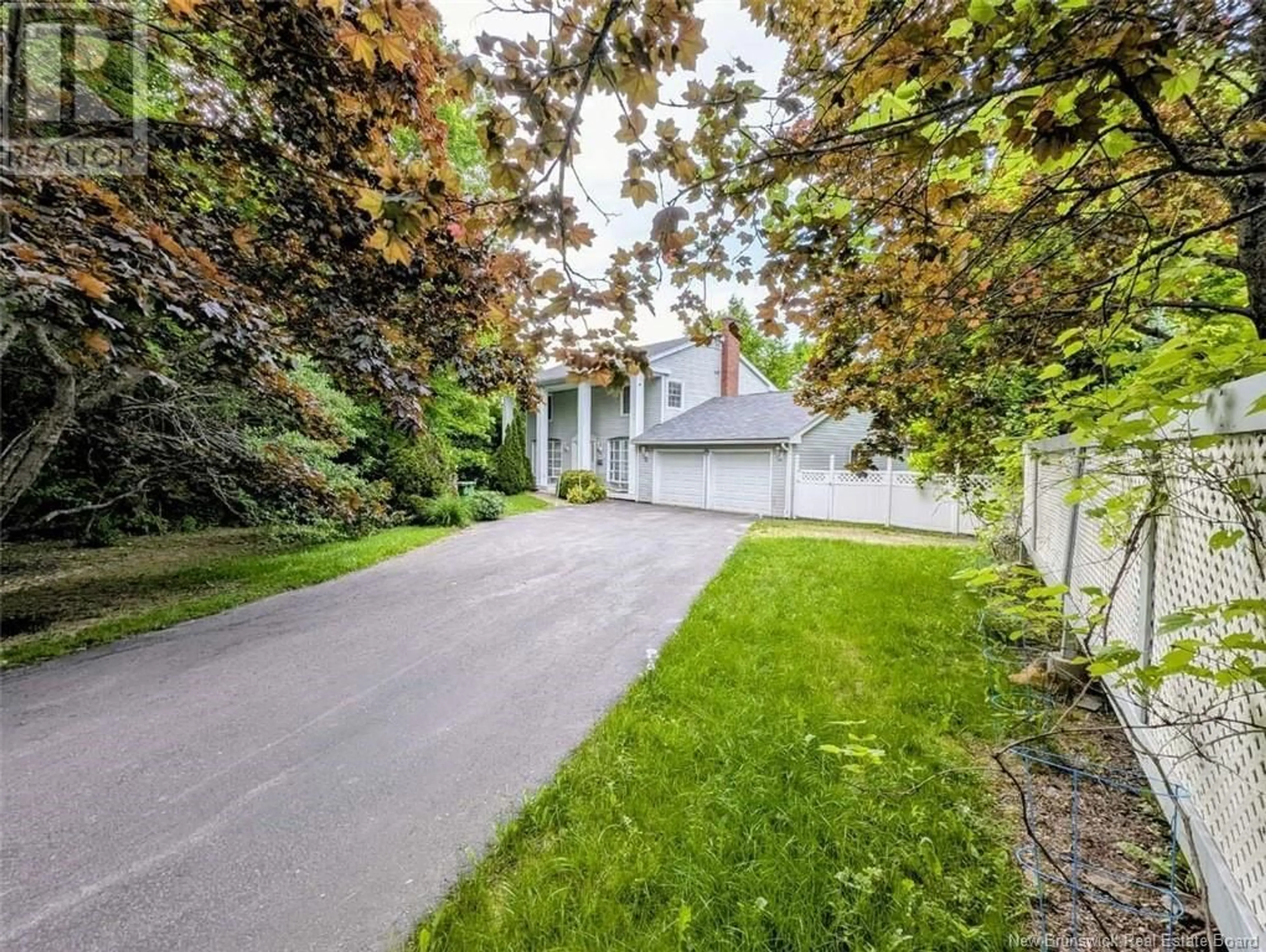 A pic from outside/outdoor area/front of a property/back of a property/a pic from drone, street for 1A HEATHER TERRACE, Fredericton New Brunswick E3B2S7