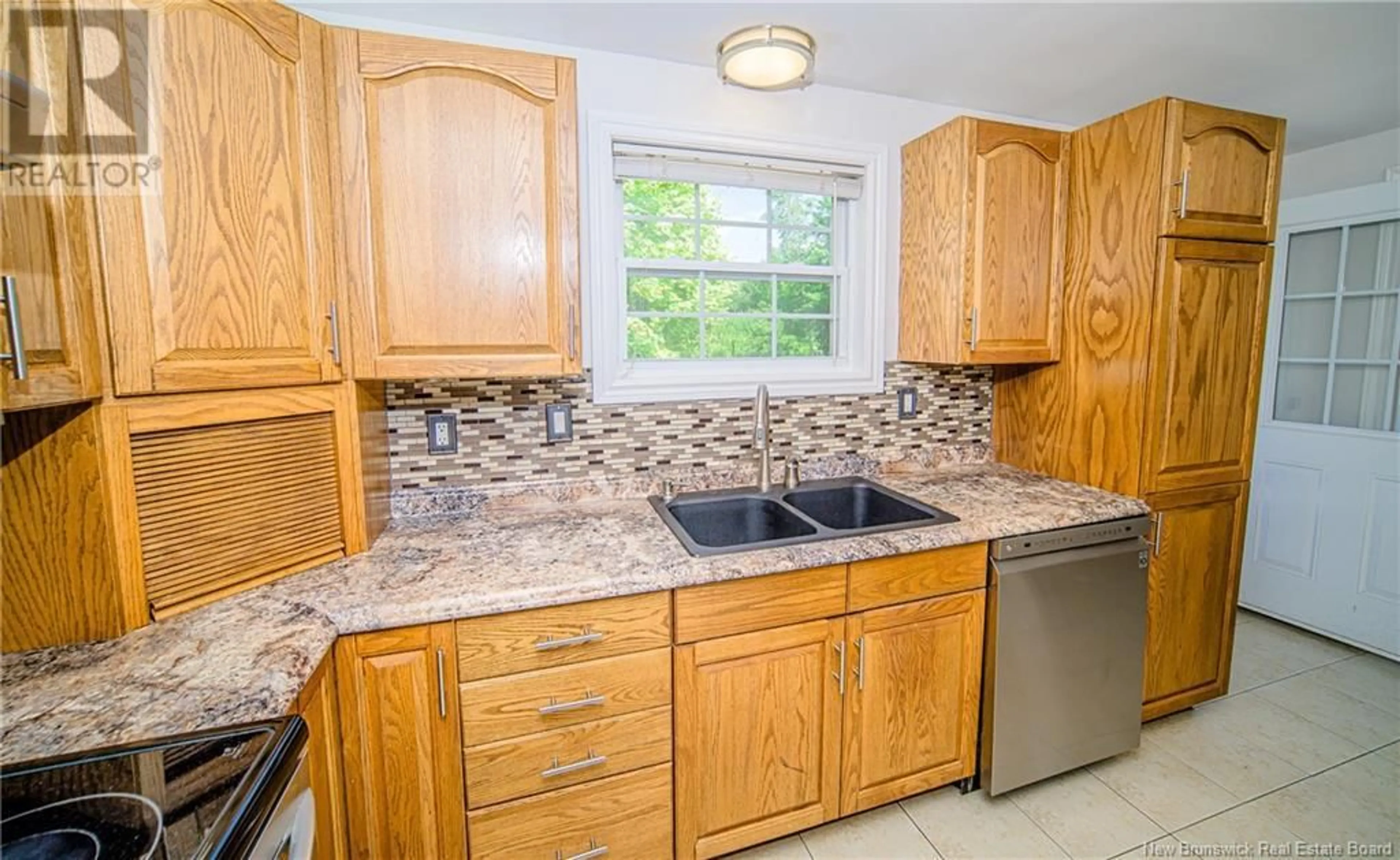 Standard kitchen, ceramic/tile floor for 779 WAASIS ROAD, Oromocto New Brunswick E2V2N4