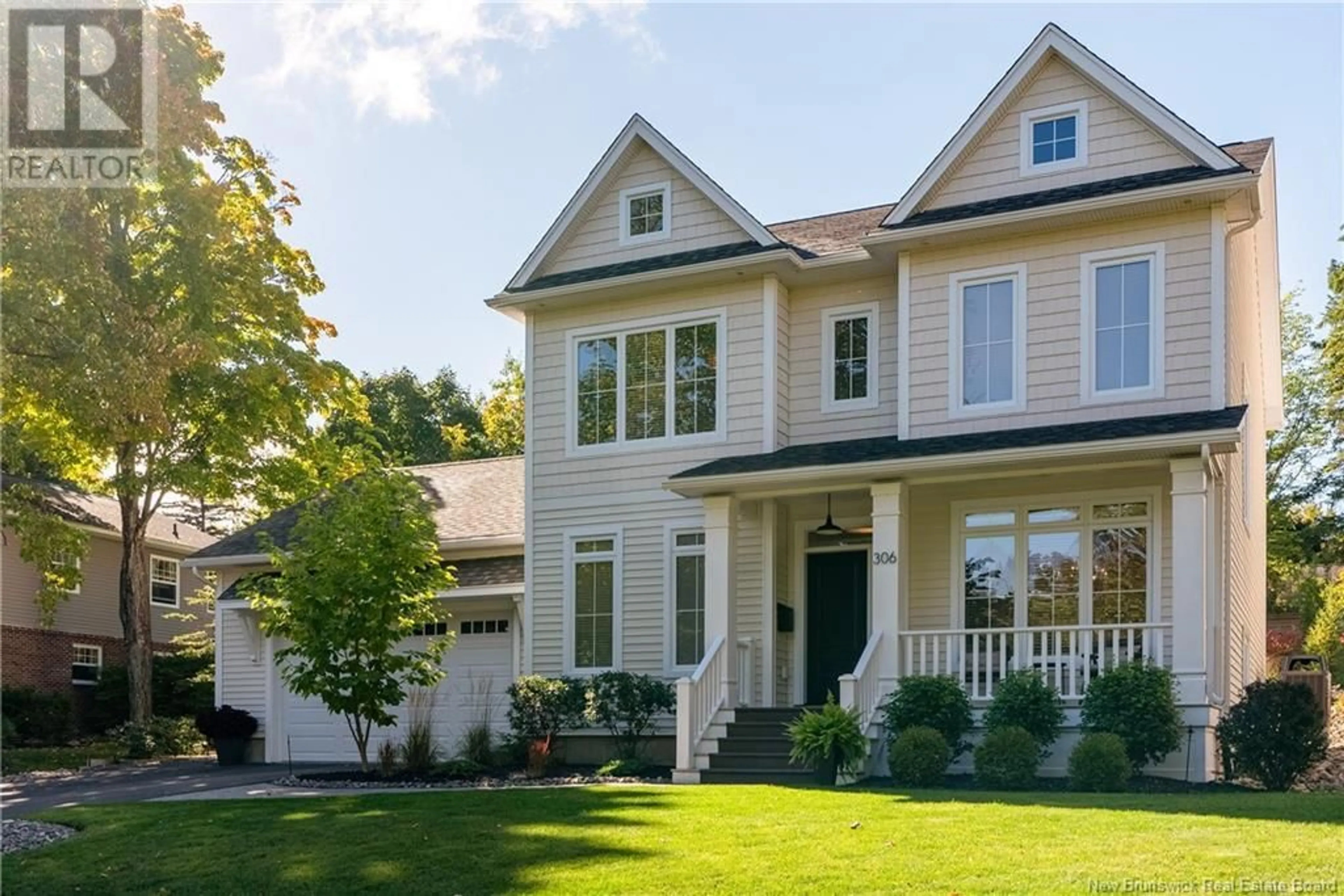 Home with vinyl exterior material, street for 306 OXFORD STREET, Fredericton New Brunswick E3B2W5