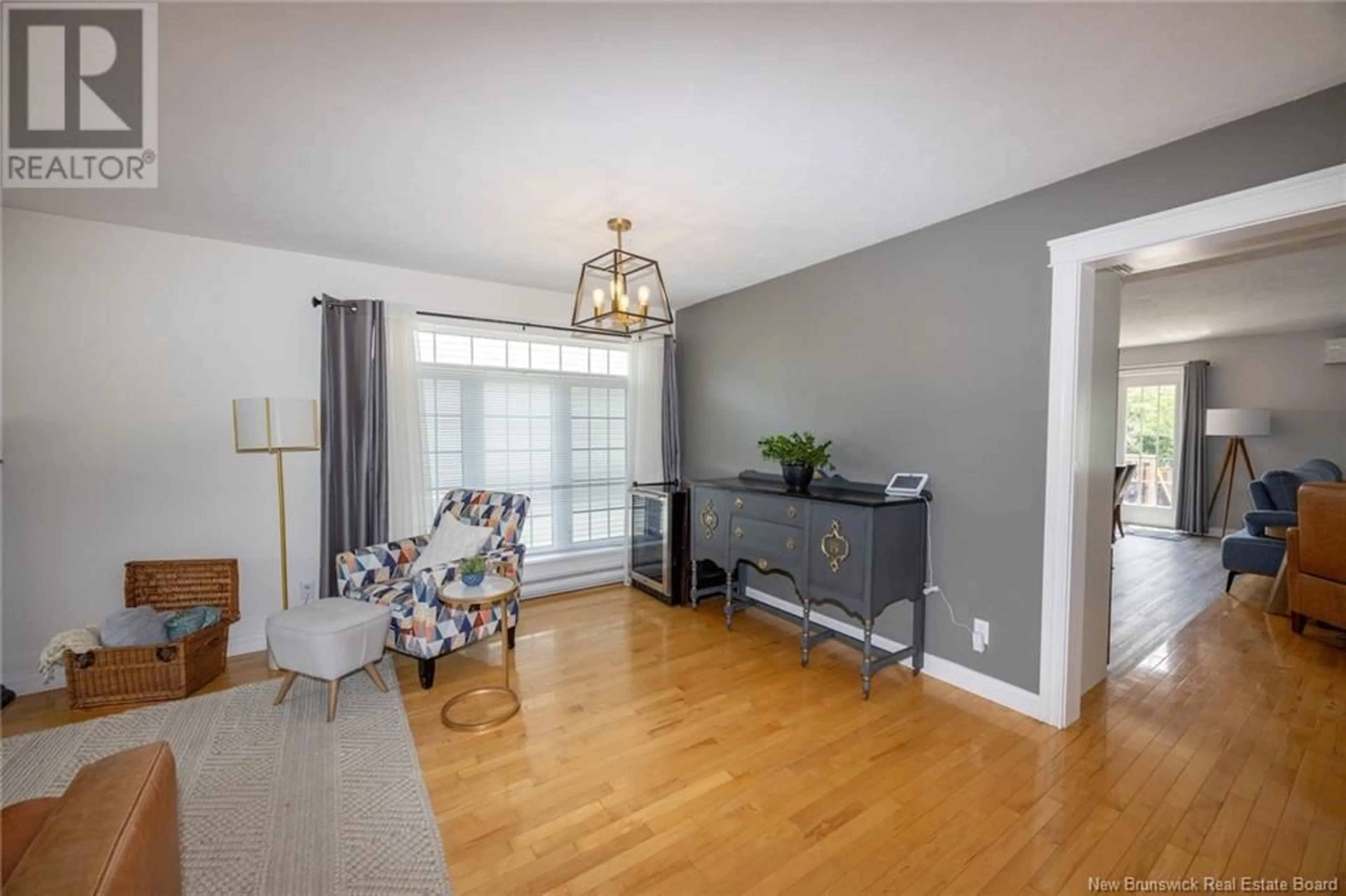 Living room with furniture, wood/laminate floor for 545 DOUGLAS AVENUE, Fredericton New Brunswick E3A5T1