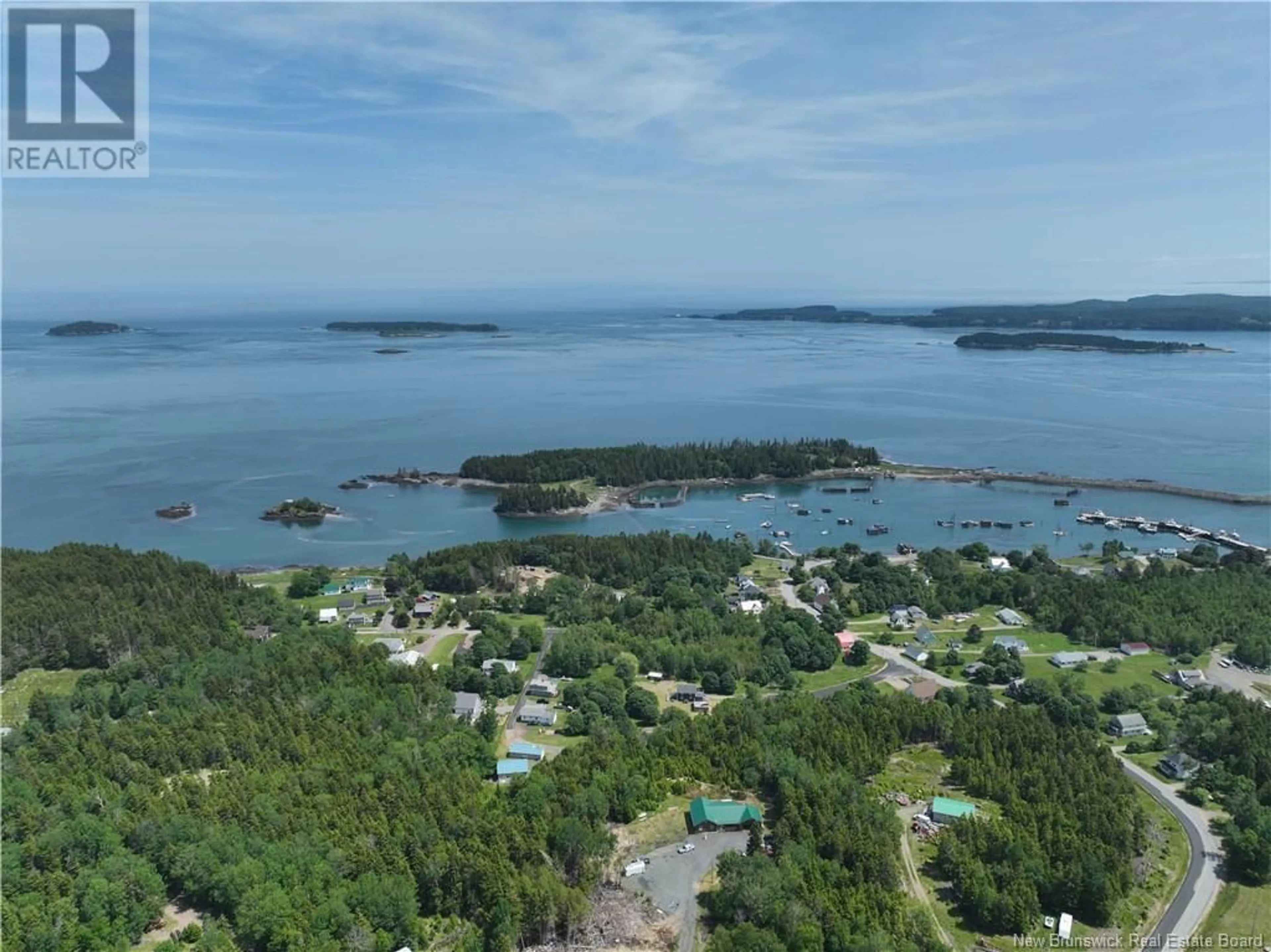 A pic from outside/outdoor area/front of a property/back of a property/a pic from drone, water/lake/river/ocean view for 12 HARTFORD ROAD, Leonardville New Brunswick E5V1K9