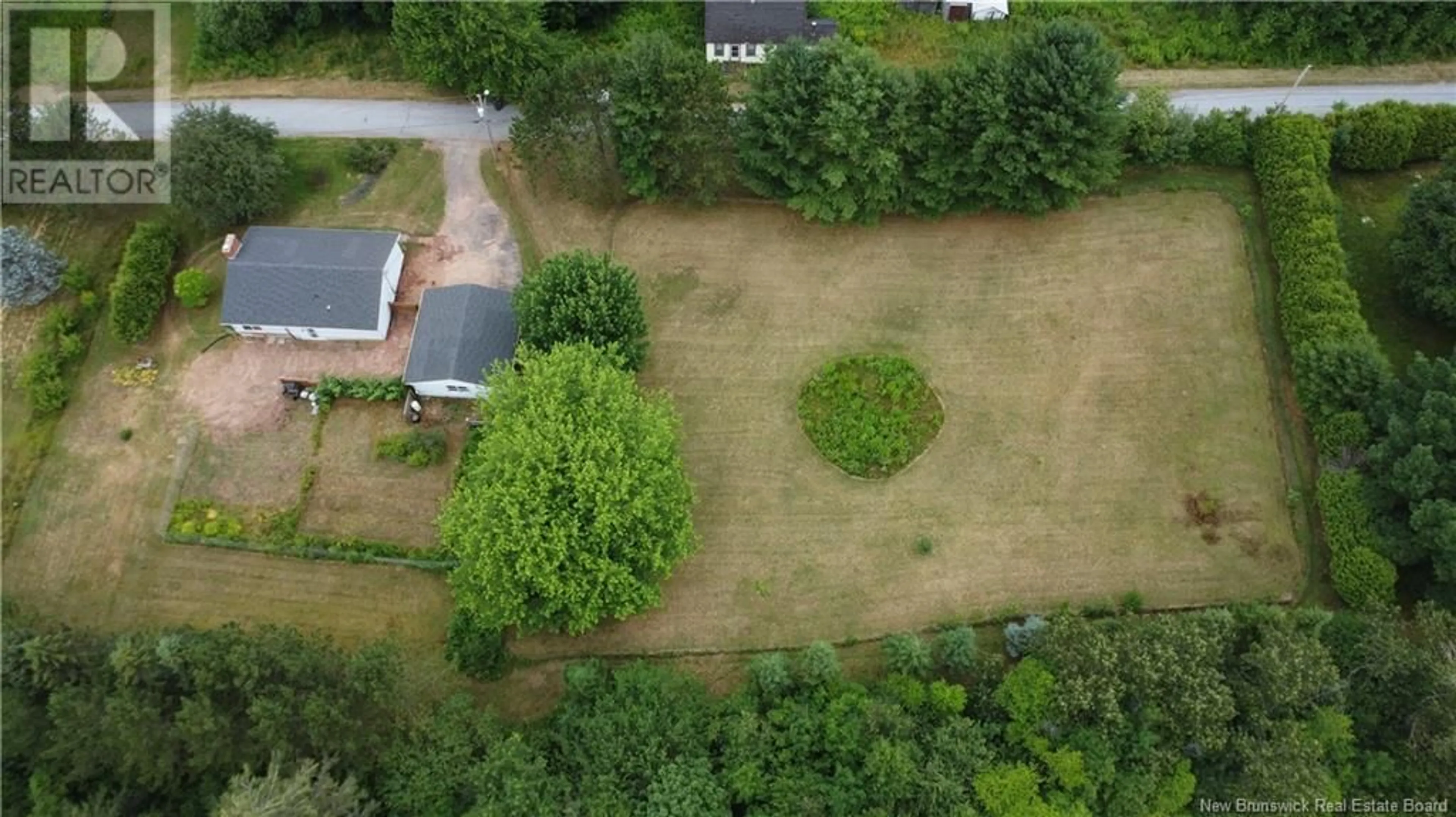 A pic from outside/outdoor area/front of a property/back of a property/a pic from drone, forest/trees view for 45 BOVAIRD STREET, Hampton New Brunswick E5N3A5