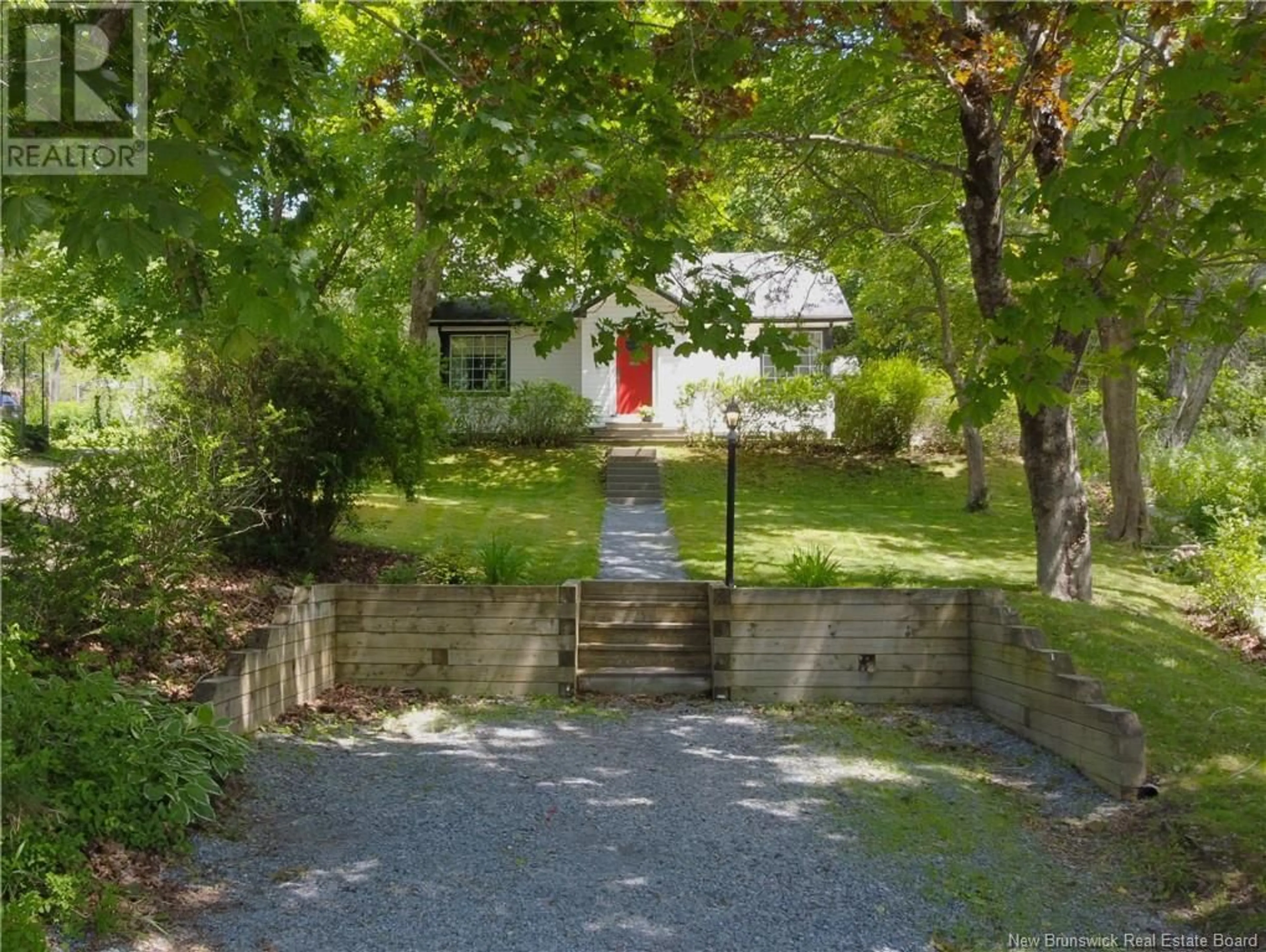 A pic from outside/outdoor area/front of a property/back of a property/a pic from drone, street for 1950 ROTHESAY ROAD, Rothesay New Brunswick E2H2J7