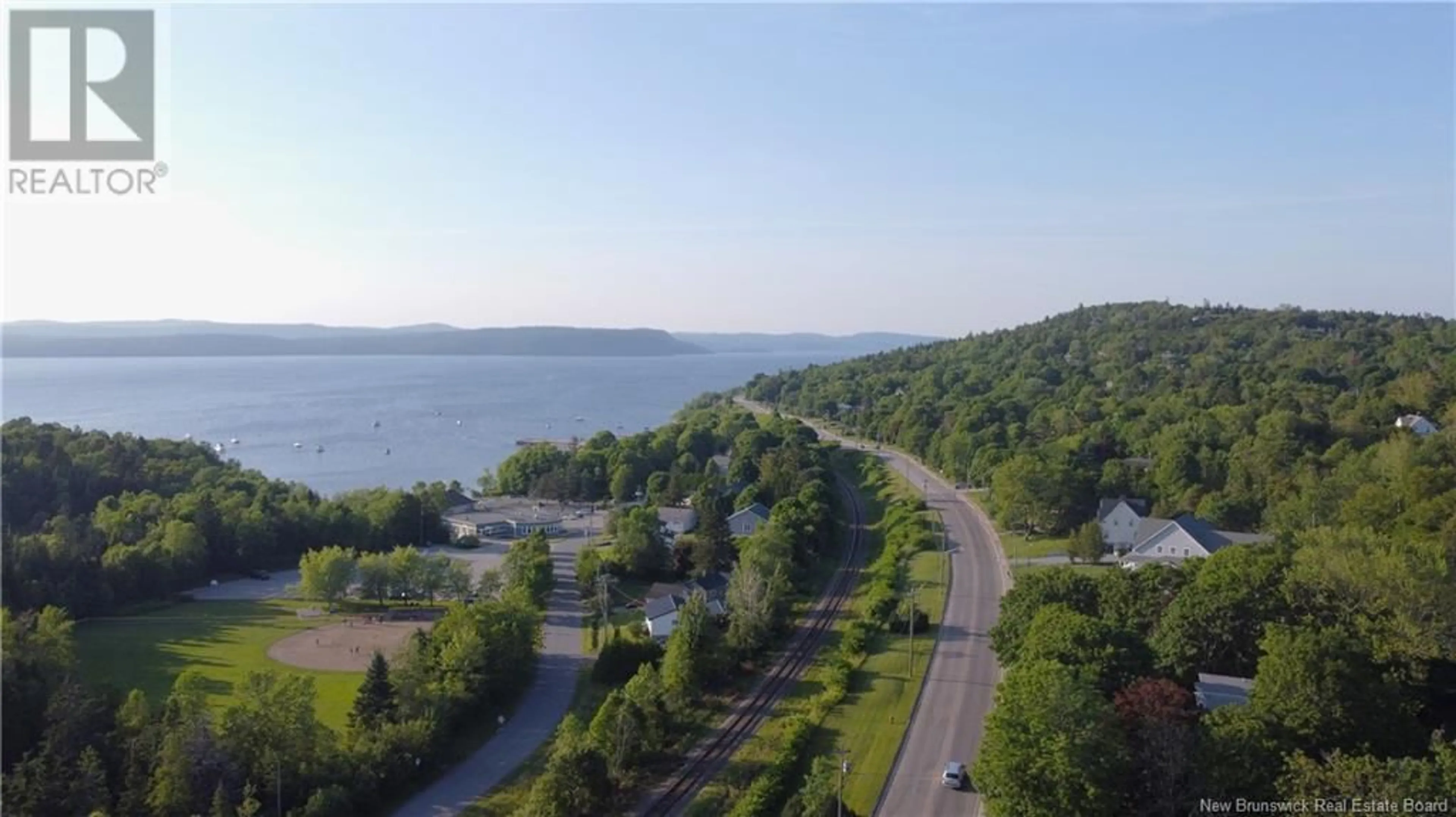A pic from outside/outdoor area/front of a property/back of a property/a pic from drone, water/lake/river/ocean view for 1950 ROTHESAY ROAD, Rothesay New Brunswick E2H2J7