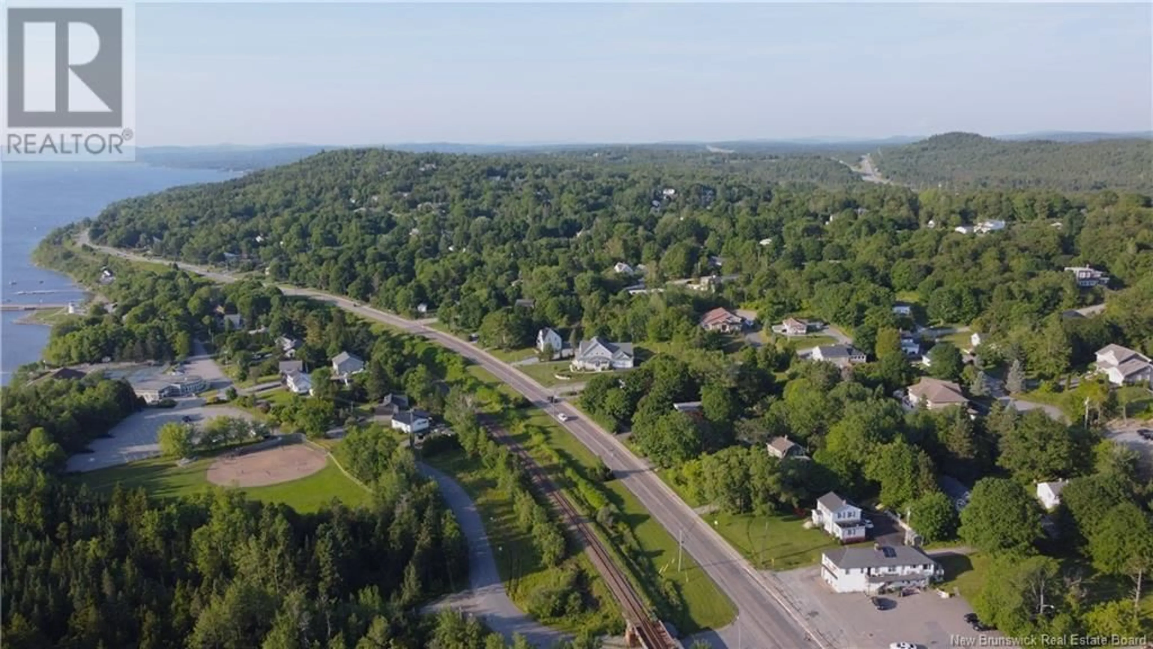 A pic from outside/outdoor area/front of a property/back of a property/a pic from drone, unknown for 1950 ROTHESAY ROAD, Rothesay New Brunswick E2H2J7