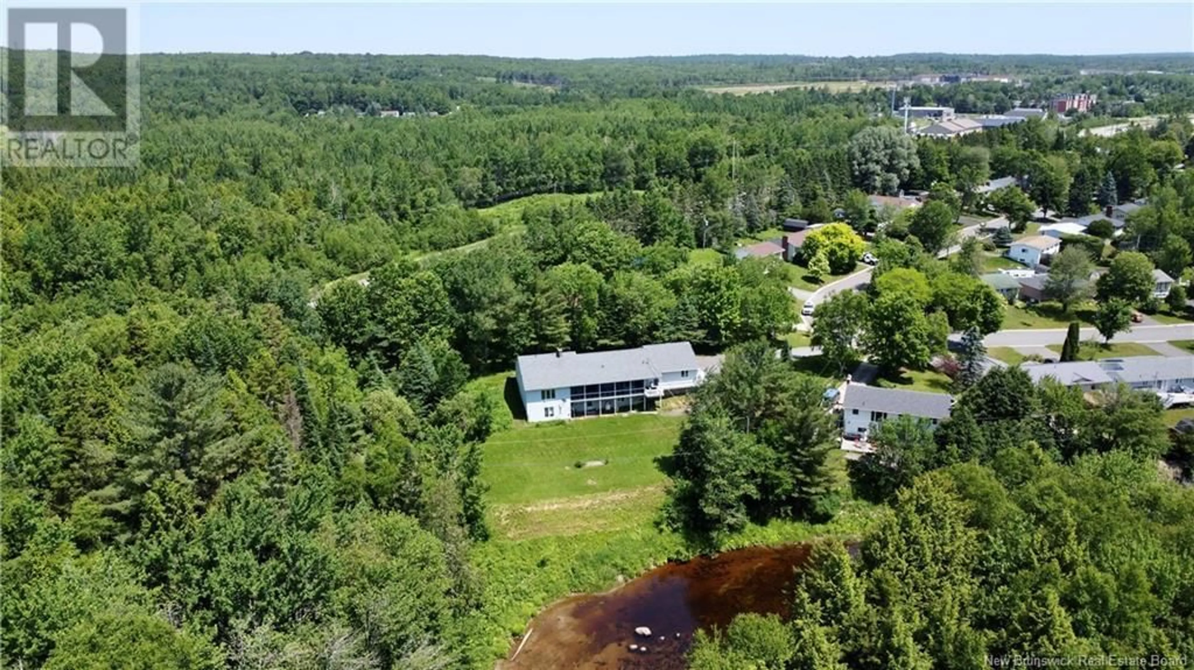 A pic from outside/outdoor area/front of a property/back of a property/a pic from drone, water/lake/river/ocean view for 39 HAINES CRESCENT, Fredericton New Brunswick E3A4X3