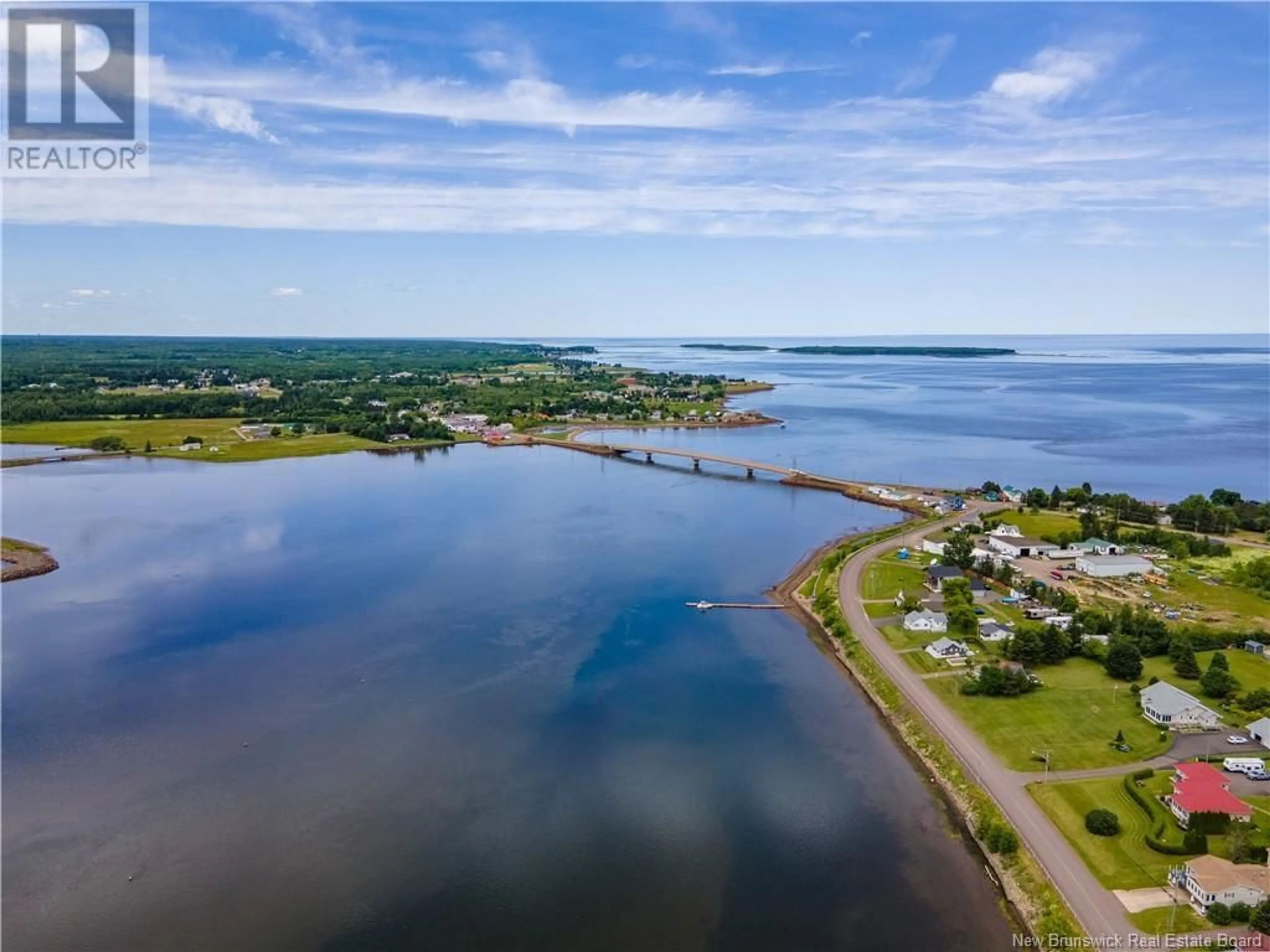 A pic from outside/outdoor area/front of a property/back of a property/a pic from drone, water/lake/river/ocean view for 132 CHEMIN COCAGNE SUD, Cocagne New Brunswick E4R2K5