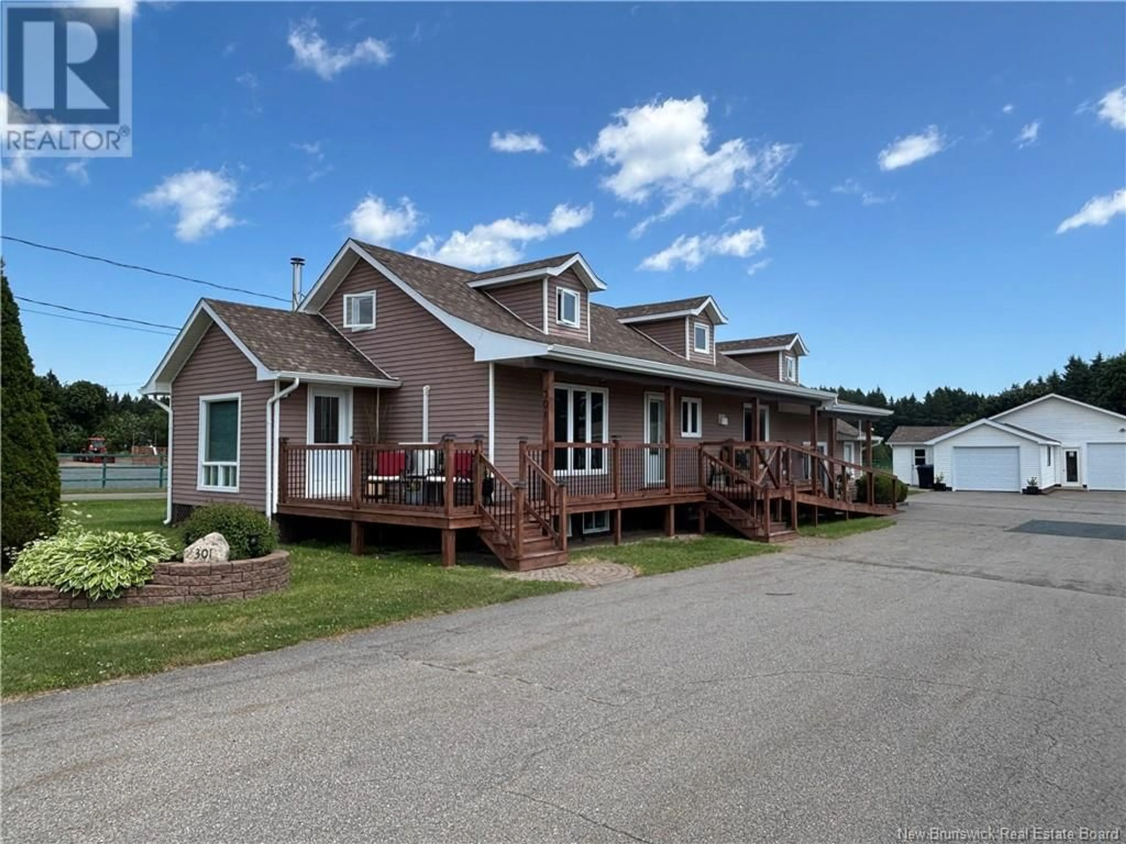 A pic from outside/outdoor area/front of a property/back of a property/a pic from drone, water/lake/river/ocean view for 301 ROUTE 134, Petit-Rocher-Nord New Brunswick E8J1E5
