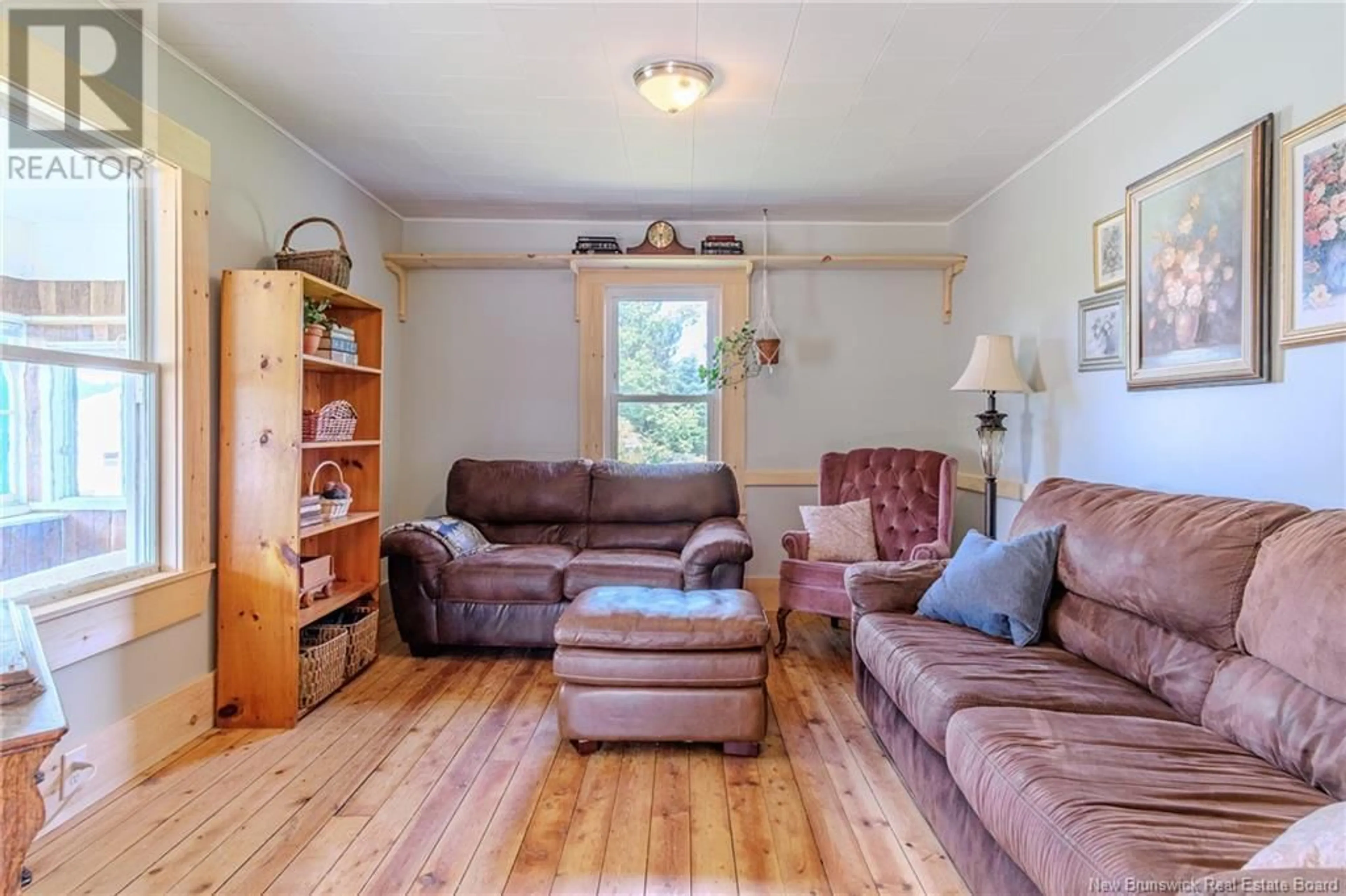 Living room with furniture, wood/laminate floor for 62 ROUTE 124, Norton New Brunswick E5T4Z1