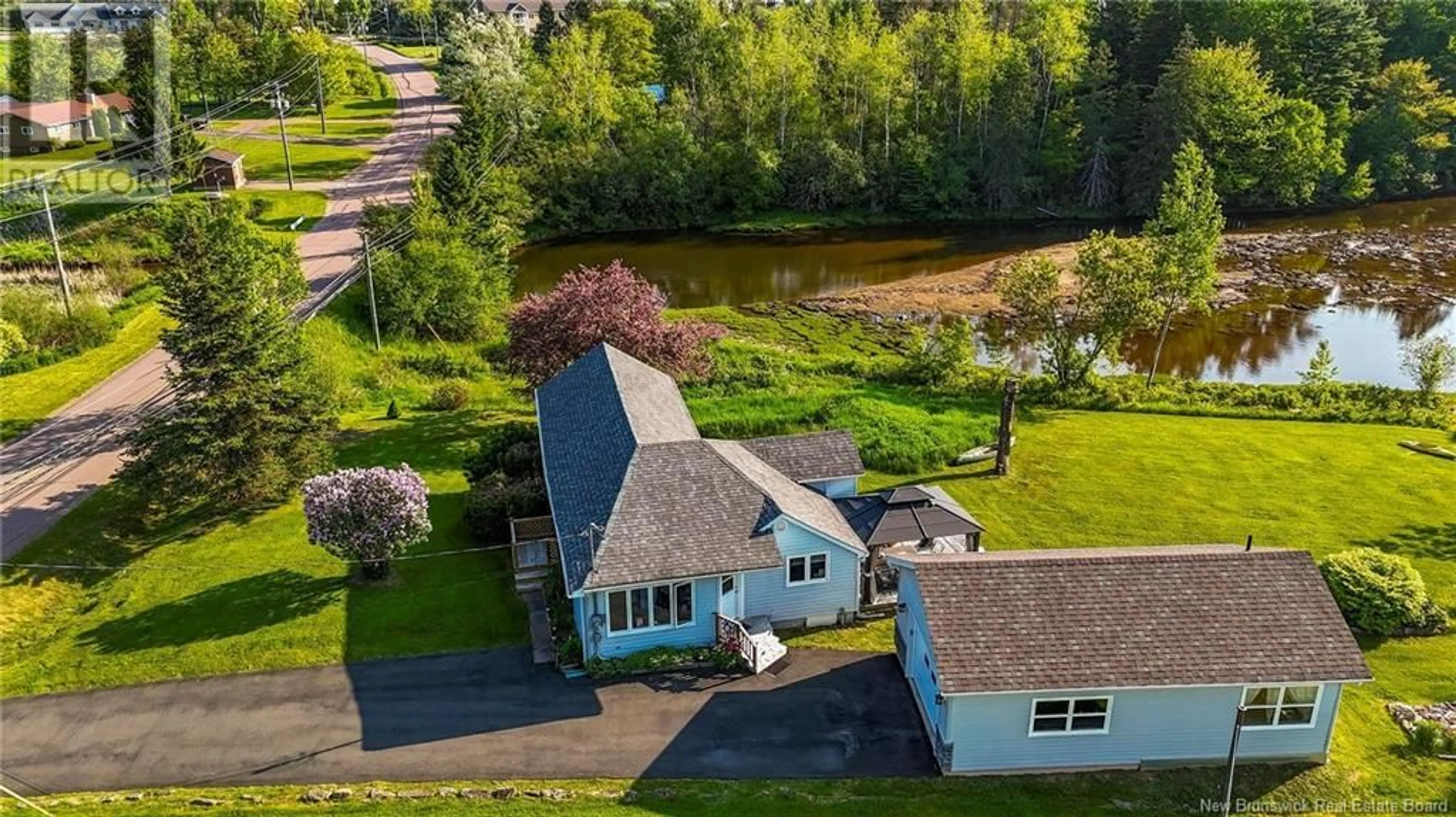 A pic from outside/outdoor area/front of a property/back of a property/a pic from drone, water/lake/river/ocean view for 106 CORNWALL ROAD, Shediac New Brunswick E4P1P3