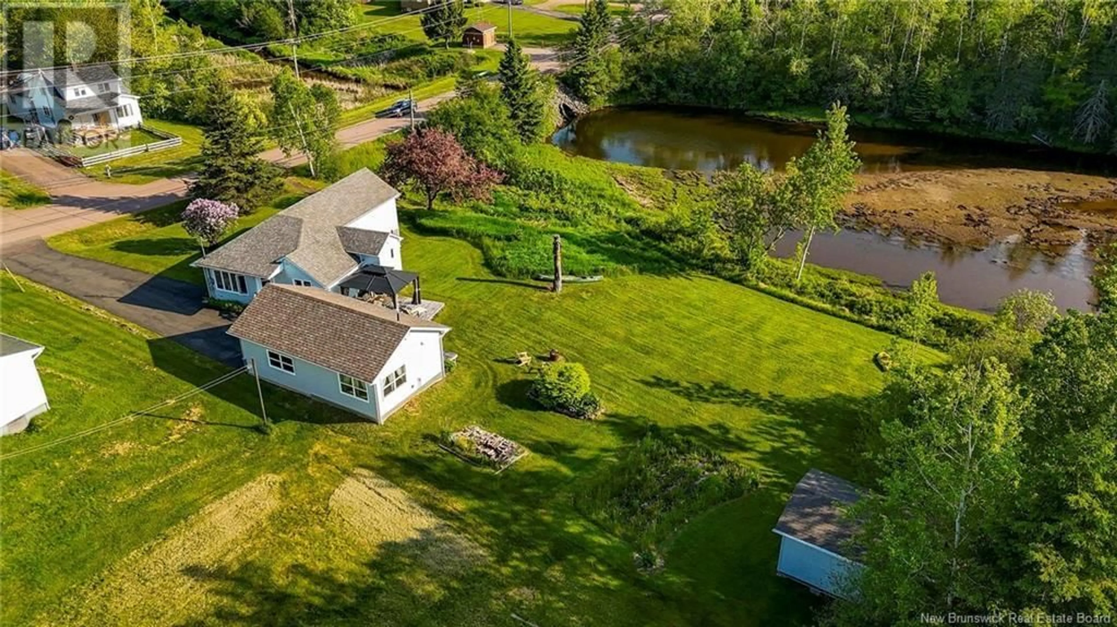 A pic from outside/outdoor area/front of a property/back of a property/a pic from drone, water/lake/river/ocean view for 106 CORNWALL ROAD, Shediac New Brunswick E4P1P3