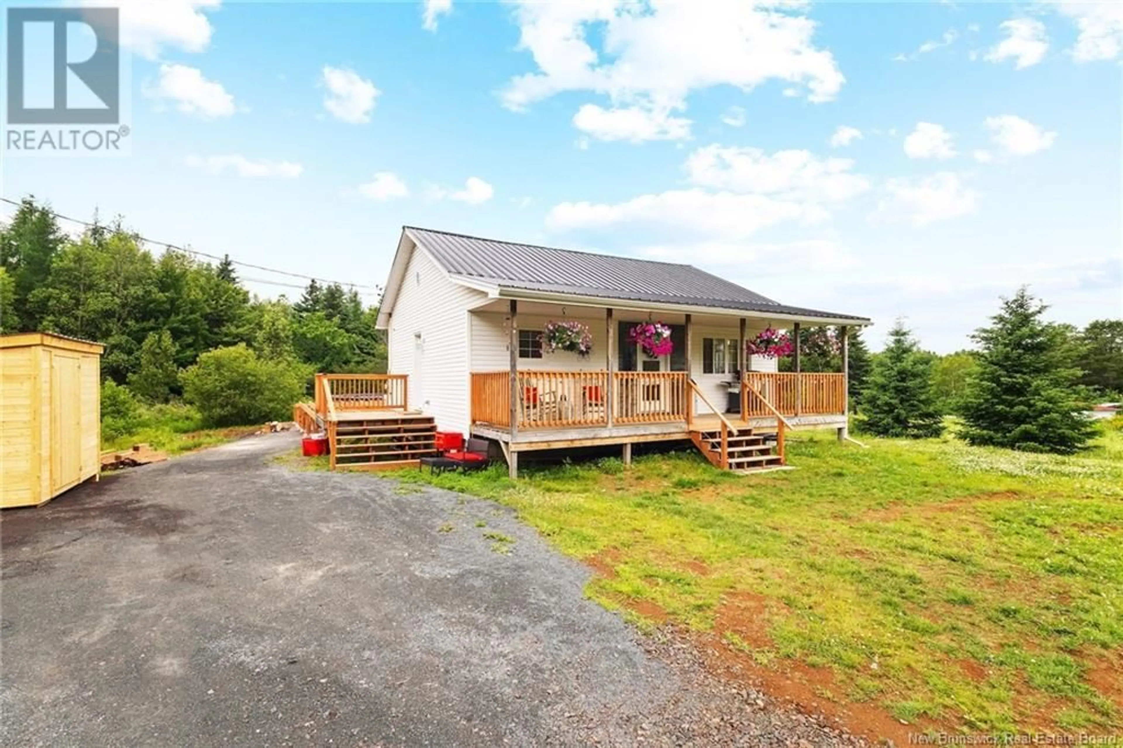A pic from outside/outdoor area/front of a property/back of a property/a pic from drone, unknown for 756 MAIN STREET, Chipman New Brunswick E4A2R5