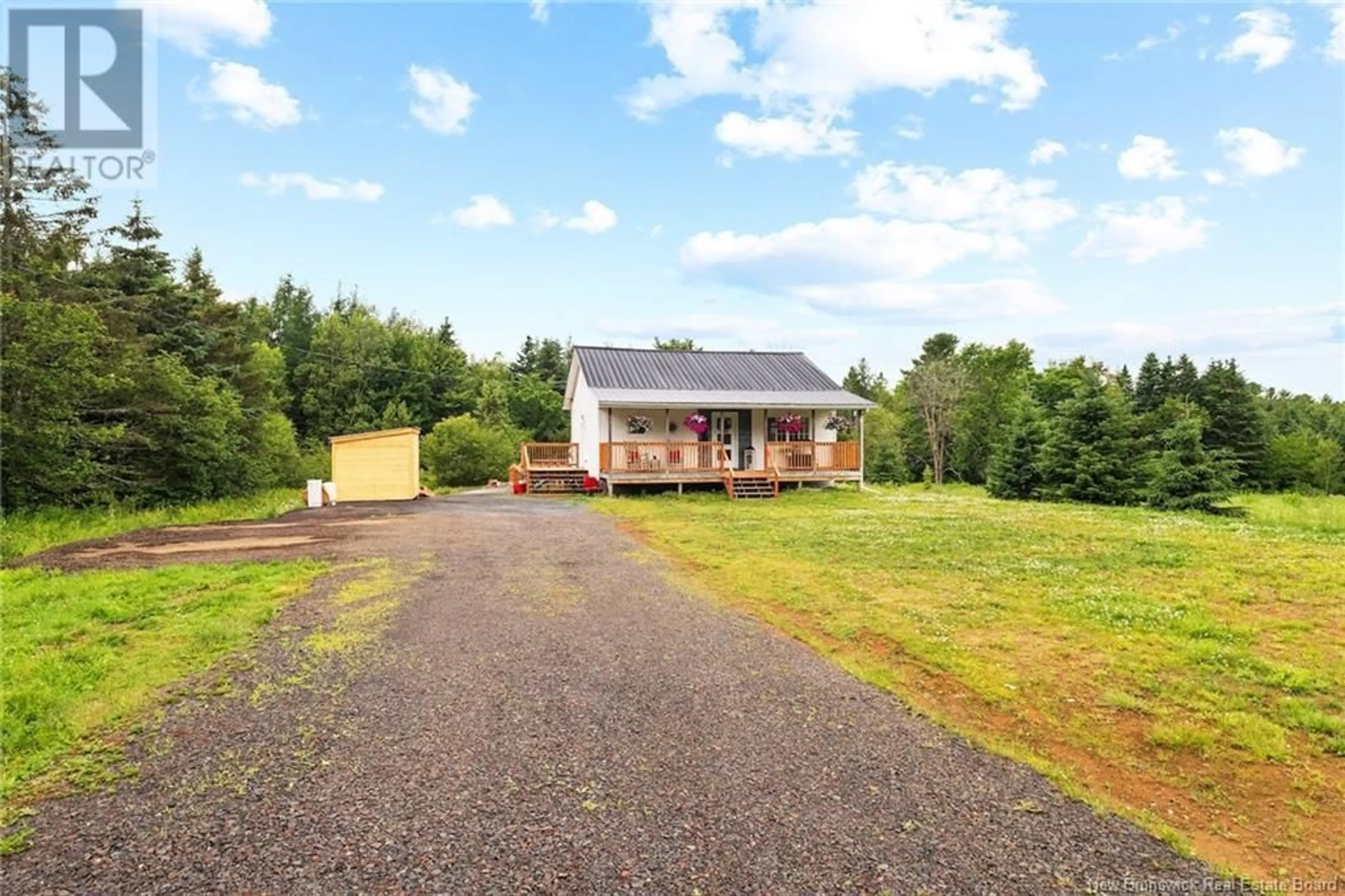 A pic from outside/outdoor area/front of a property/back of a property/a pic from drone, unknown for 756 MAIN STREET, Chipman New Brunswick E4A2R5