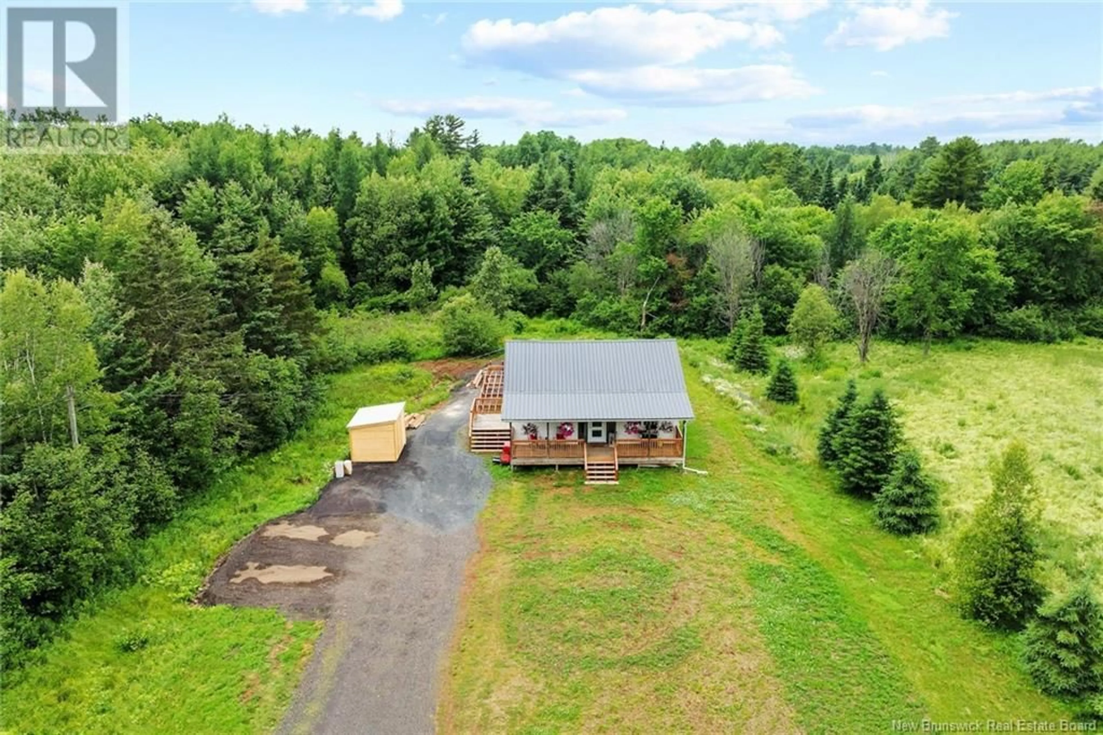 A pic from outside/outdoor area/front of a property/back of a property/a pic from drone, unknown for 756 MAIN STREET, Chipman New Brunswick E4A2R5