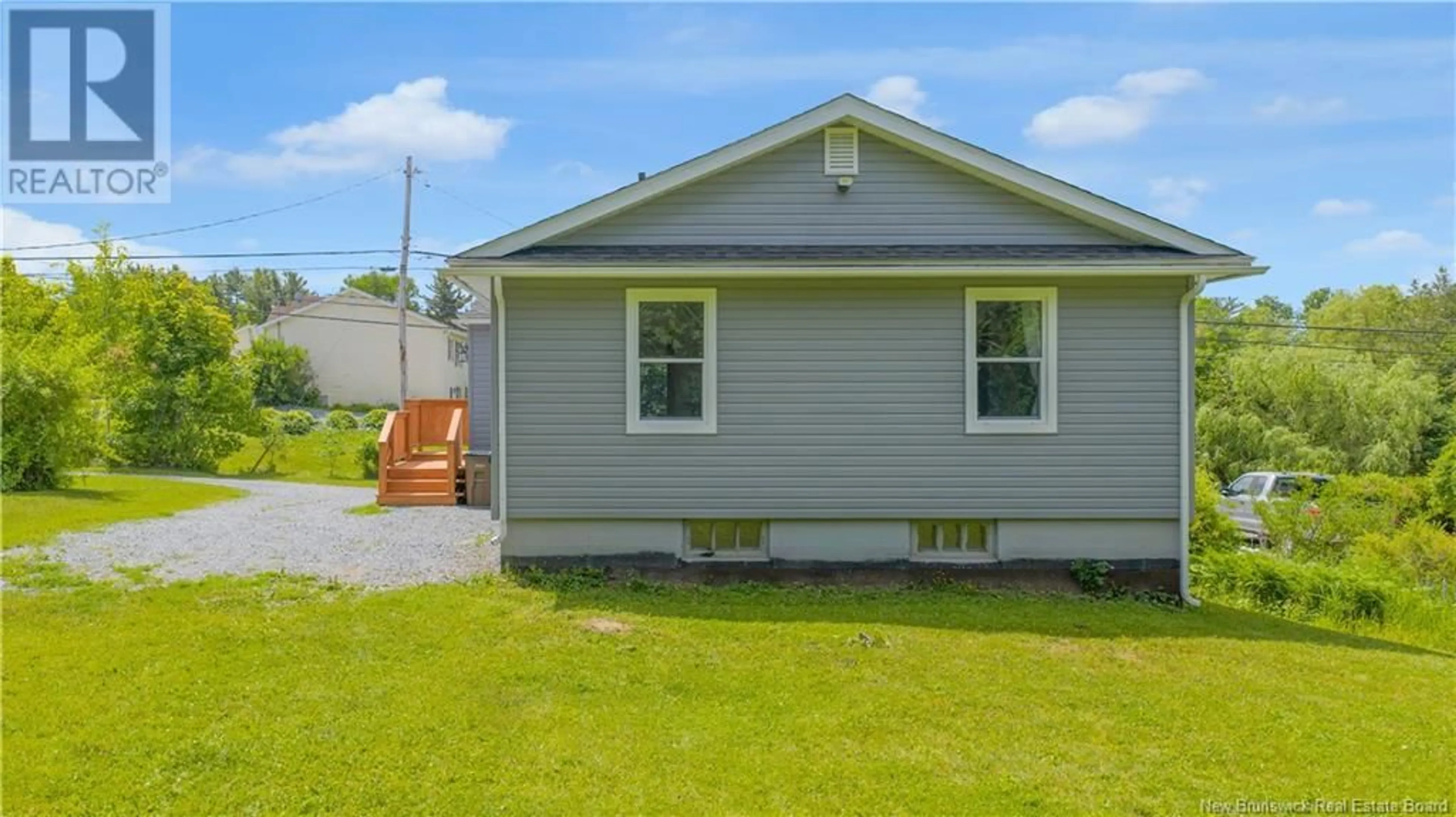 Home with vinyl exterior material, street for 3200 WESTFIELD ROAD, Saint John New Brunswick E2M6V1