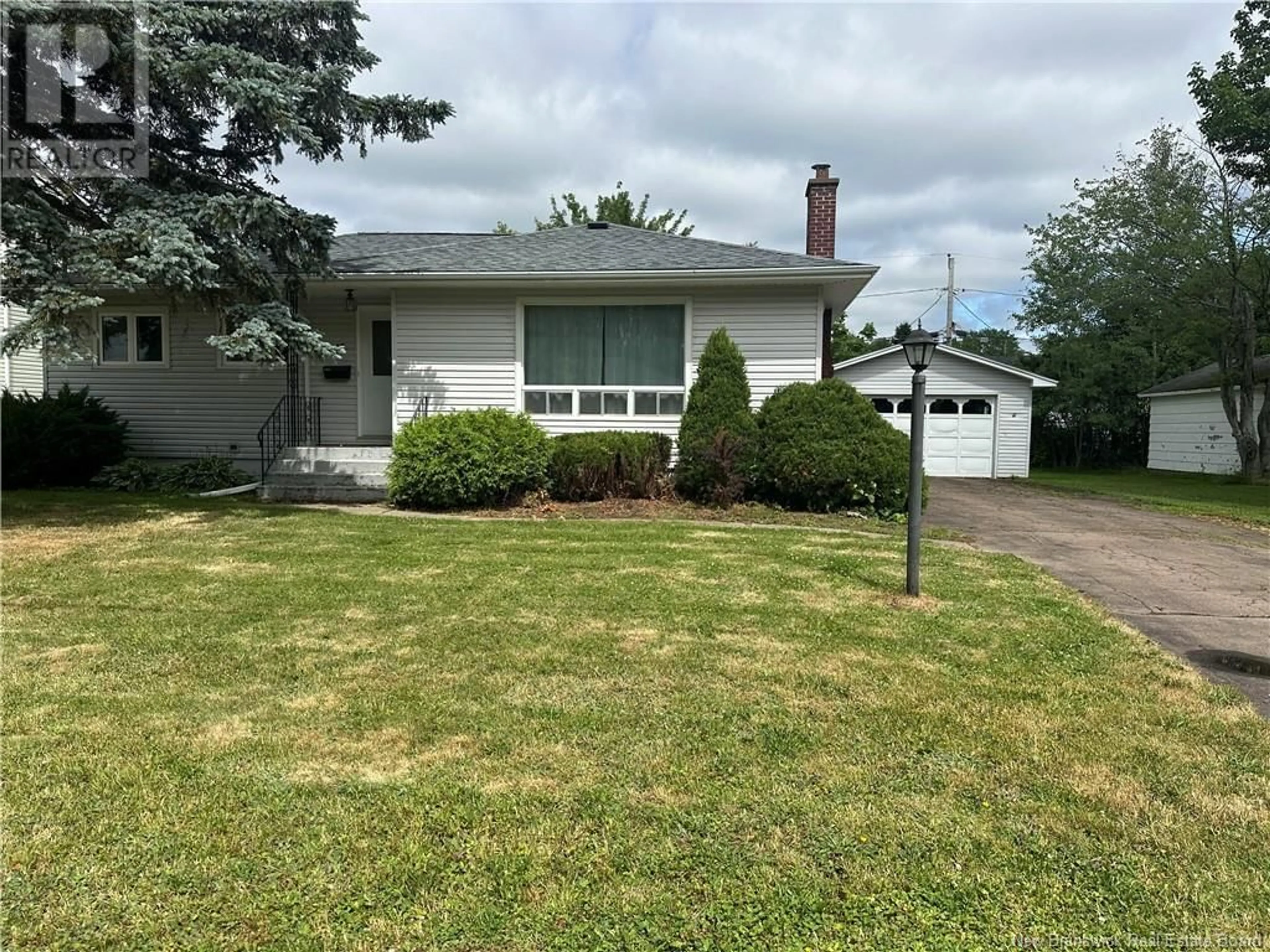 Home with vinyl exterior material, street for 43 FRIER STREET, Moncton New Brunswick E1A4L7