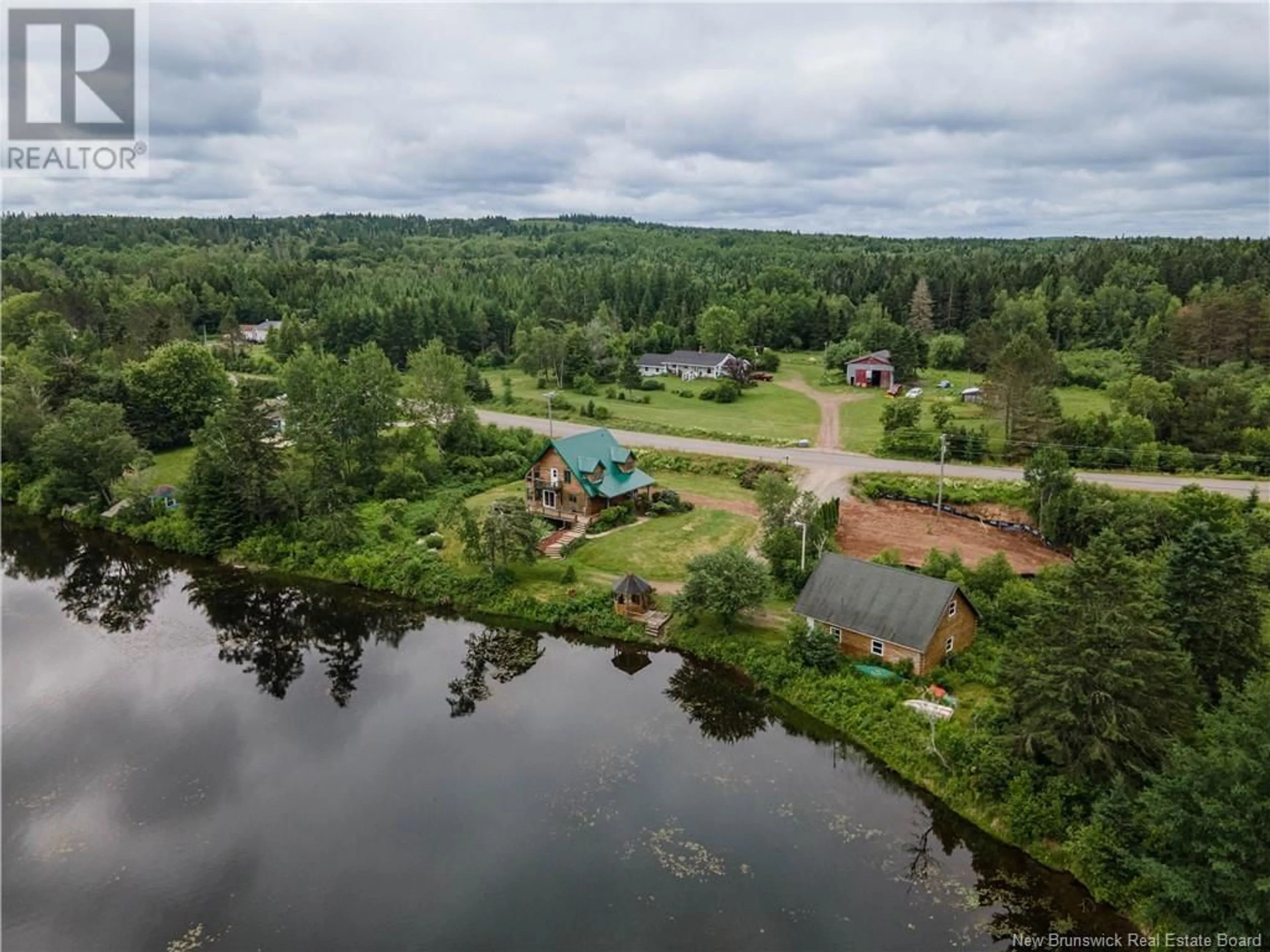 A pic from outside/outdoor area/front of a property/back of a property/a pic from drone, water/lake/river/ocean view for 1211 ROUTE 865, Cassidy Lake New Brunswick E4E5Y6